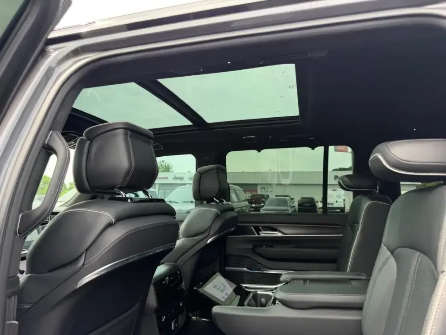 2024 /Global Black Leather Jeep Grand Wagoneer Series II (1C4SJVFP3RS) with an 3.0L I6 Hurricane HO Twin Turbo ESS engine, Automatic transmission, located at 970 Woodlawn Dr., Farmington, MO, 63640, (573) 431-7800, 37.825642, -90.468674 - Built for big weekends, long road trips, and everyday luxury family duty, this **2024 Jeep Grand Wagoneer Series II** is the kind of SUV that turns a simple drive into an event. Whether you're loading up for a lakeside getaway, shuttling kids and friends across town, or commuting in comfort from Far - Photo#11