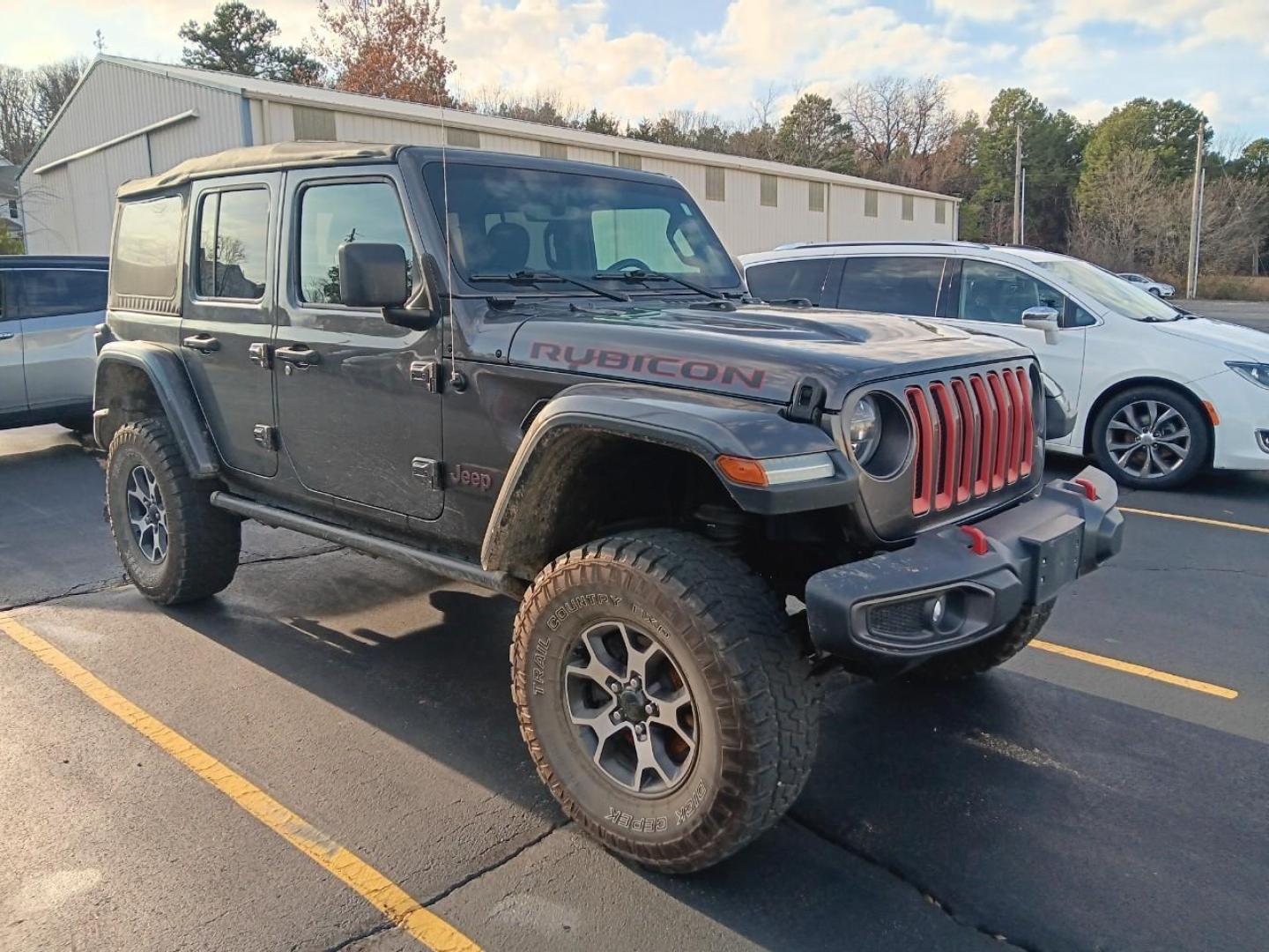 2021 /Black Cloth Jeep Wrangler Unlimited Rubicon (1C4HJXFN2MW) with an 2.0L L4 DOHC 16V TURBO engine, 6A transmission, located at 141 Commercial Dr, Fredericktown, MO, 63645, (573) 783-6432, 37.570087, -90.320648 - USED 2021 Jeep Wrangler Unlimited Rubicon from Pettus CDJR Farmington, Farmington MO. - Photo#0