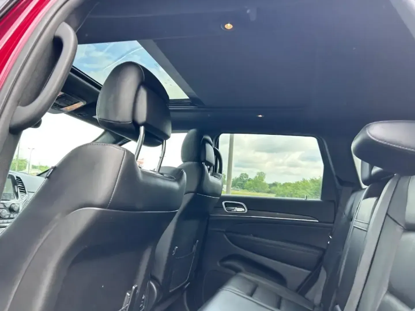 2022 /Black Leather Jeep Grand Cherokee Limited (1C4RJFBG4NC) with an 3.6L V6 24V VVT UPG I engine, 8A transmission, located at 970 Woodlawn Dr., Farmington, MO, 63640, (573) 431-7800, 37.825642, -90.468674 - Discover the adventure-ready, family-friendly 2022 Jeep Grand Cherokee WK Limited, a versatile SUV designed to elevate your lifestyle in Farmington, MO. This stunning vehicle, finished in a captivating Velvet Red Pearlcoat with a luxurious black leather interior, is perfect for everything from weeke - Photo#11