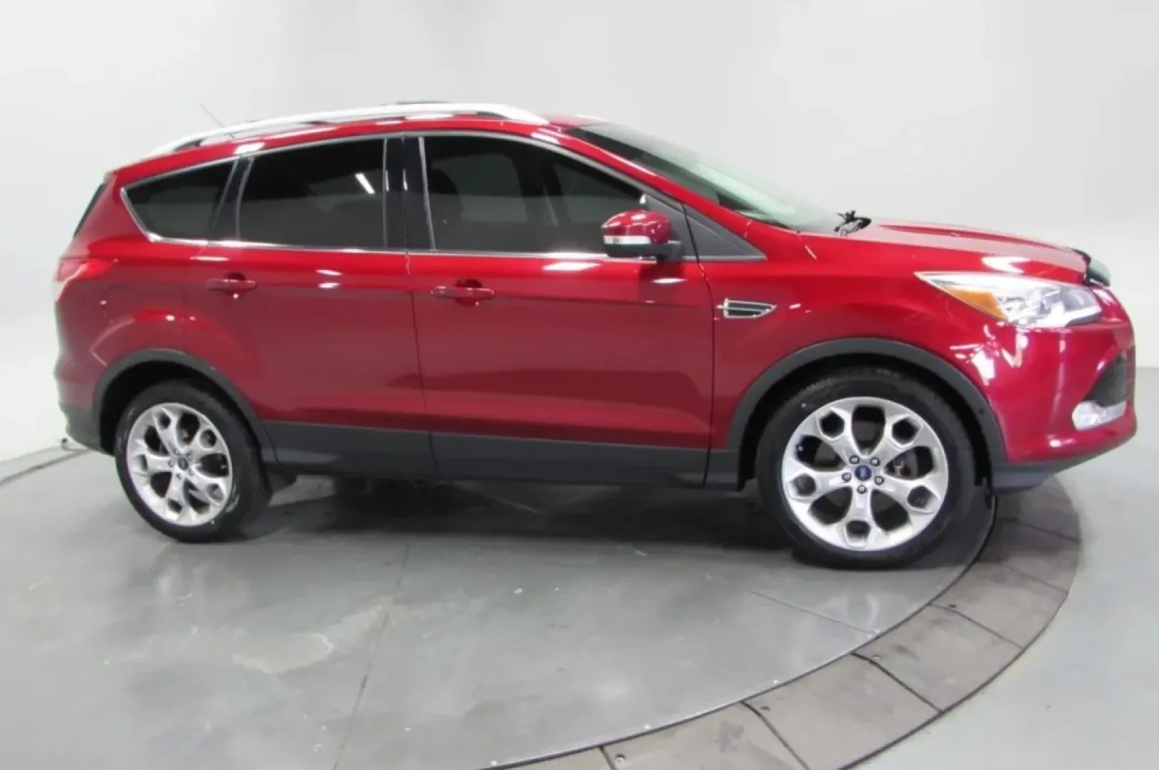2013 /Charcoal Black Leather Ford Escape Titanium (1FMCU0J98DU) with an Other engine, Automatic transmission, located at 12836 Highway 21, De Soto, MO, 63020, (636) 337-7777, 38.151867, -90.575615 - Are you ready to elevate your family adventures or daily commutes? The 2013 Ford Escape Titanium is the perfect SUV for those who crave a reliable companion for both weekend getaways and everyday errands. With a stylish red exterior and a spacious interior, this pre-owned gem from Pettus Ford De Sot - Photo#3