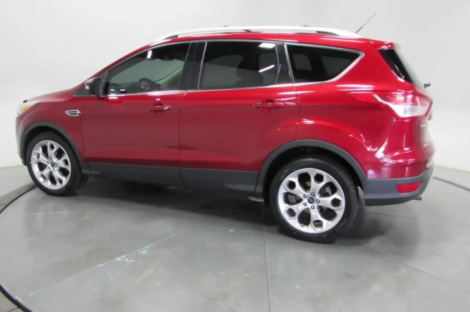 2013 /Charcoal Black Leather Ford Escape Titanium (1FMCU0J98DU) with an Other engine, Automatic transmission, located at 12836 Highway 21, De Soto, MO, 63020, (636) 337-7777, 38.151867, -90.575615 - Are you ready to elevate your family adventures or daily commutes? The 2013 Ford Escape Titanium is the perfect SUV for those who crave a reliable companion for both weekend getaways and everyday errands. With a stylish red exterior and a spacious interior, this pre-owned gem from Pettus Ford De Sot - Photo#4
