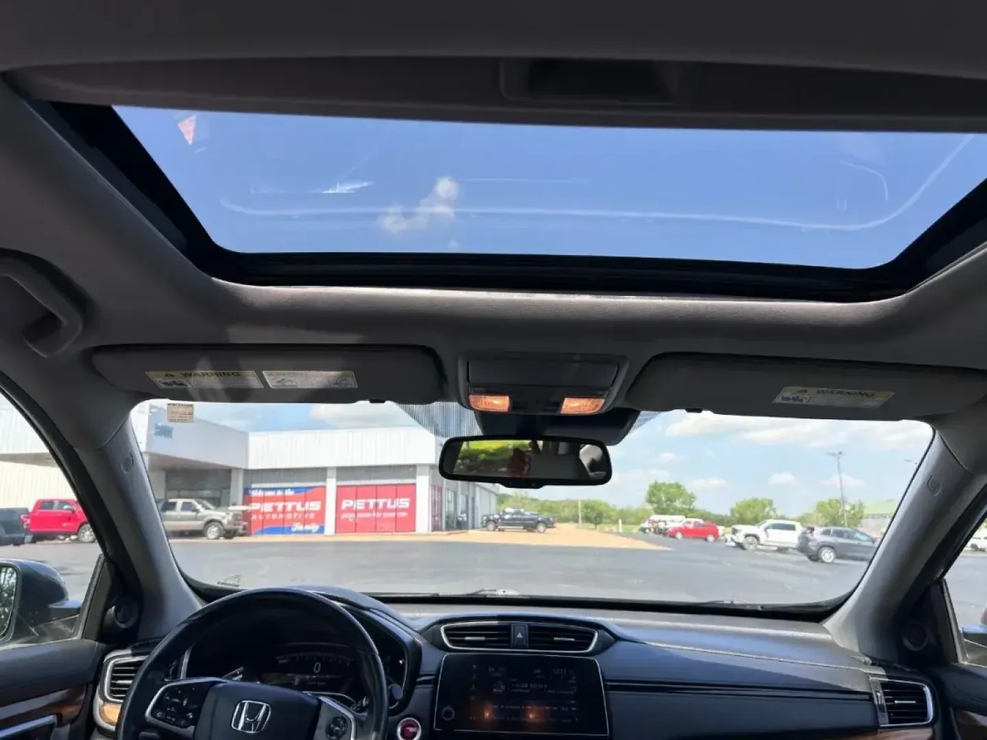 2020 /Gray Leather Honda CR-V EX-L (5J6RW2H84LA) with an 1.5L I-4 16-Valve DOHC engine, Automatic transmission, located at 970 Woodlawn Dr., Farmington, MO, 63640, (573) 431-7800, 37.825642, -90.468674 - Are you in search of a reliable and stylish SUV that perfectly balances everyday practicality with weekend adventure? Look no further than this stunning 2020 Honda CR-V EX-L, available now at Pettus CDJR Farmington. Nestled in the heart of Farmington, MO, our dealership specializes in quality used v - Photo#9