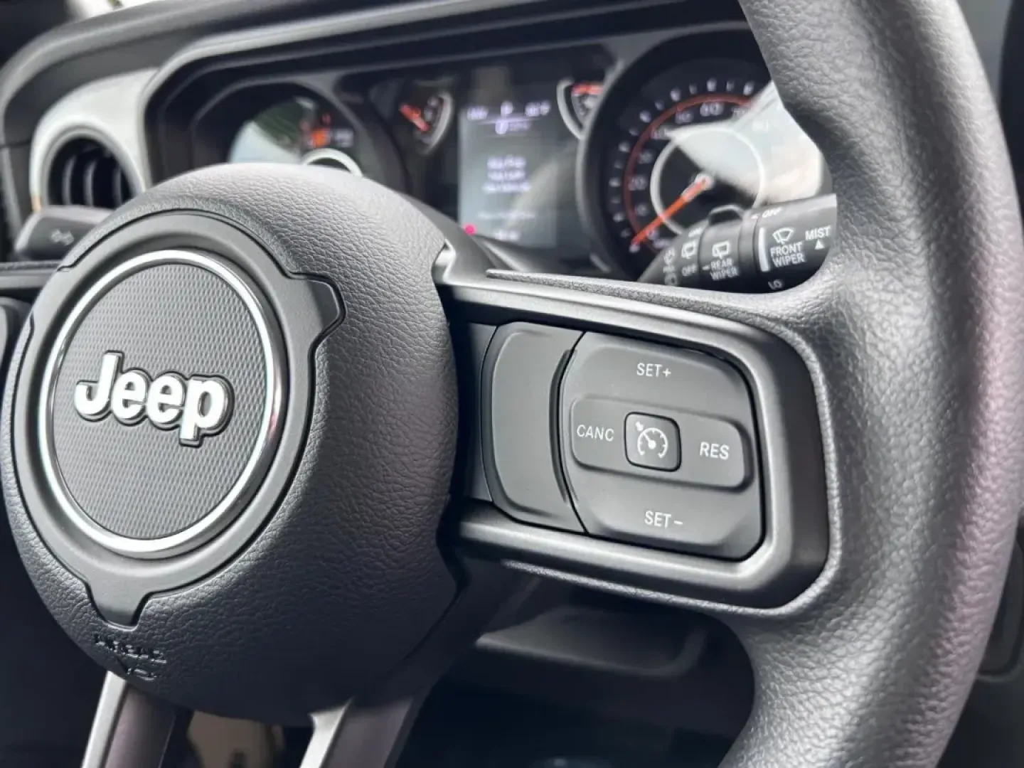 2025 /Black Cloth Jeep Wrangler Sport (1C4PJXAN4SW) with an 2.0L Turbocharged engine, located at 970 Woodlawn Dr., Farmington, MO, 63640, (573) 431-7800, 37.825642, -90.468674 - **Adventure Awaits: Explore the 2025 Jeep Wrangler at Pettus CDJR Farmington!**<br /> <br /> If you're ready to elevate your weekend adventures or daily commutes, look no further than the stunning 2025 Jeep Wrangler available at Pettus CDJR Farmington. This sport utility vehicle is perfect for thril - Photo#12