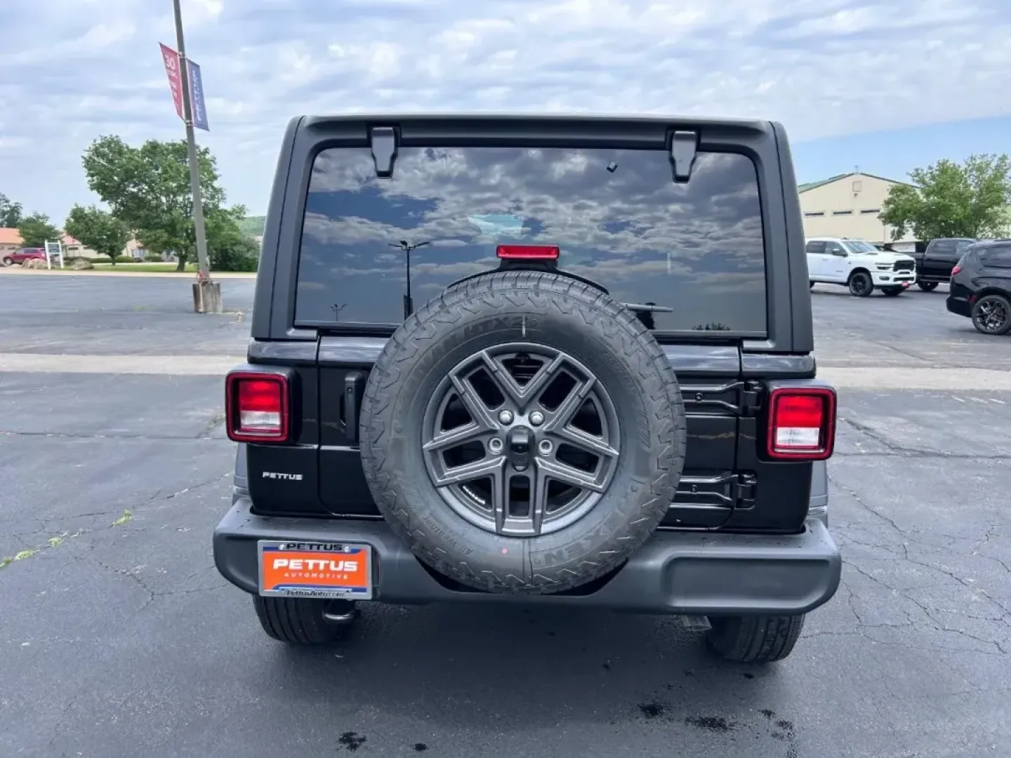 2025 /Black Cloth Jeep Wrangler Sport S (1C4PJXDG8SW) with an 3.6L V6 24V VVT UPG I engine, located at 970 Woodlawn Dr., Farmington, MO, 63640, (573) 431-7800, 37.825642, -90.468674 - Experience the thrill of adventure with the 2025 Jeep Wrangler Sport S, the perfect companion for weekend escapades and off-road journeys. Whether you're navigating the rugged trails of the Ozarks or cruising through the scenic views around Farmington, MO, this SUV is designed to elevate your lifest - Photo#3