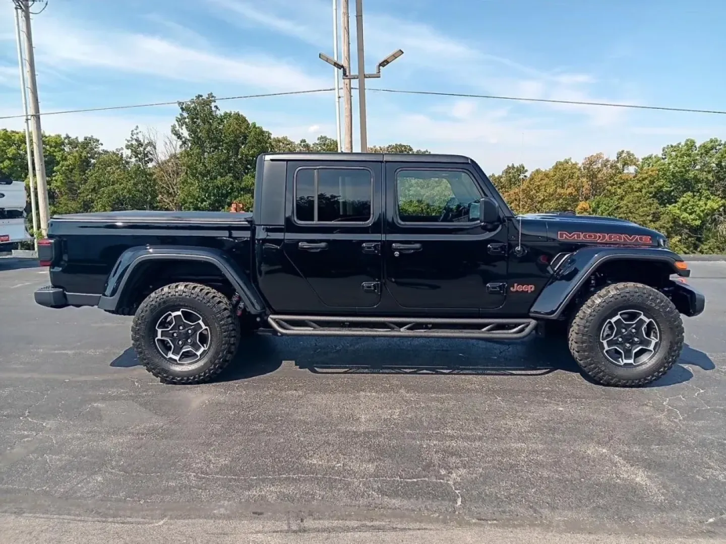 2023 /Black Jeep Gladiator Mojave (1C6JJTEG0PL) with an Other engine, located at 12836 Highway 21, De Soto, MO, 63020, (636) 337-7777, 38.151867, -90.575615 - **Conquer the Great Outdoors with the 2023 Jeep Gladiator 4WD Mojave at Pettus Ford De Soto!**<br /> <br /> Are you ready to elevate your outdoor adventures? The 2023 Jeep Gladiator 4WD Mojave is the ultimate vehicle for thrill-seekers and weekend explorers in De Soto, MO. Whether you're planning a - Photo#1