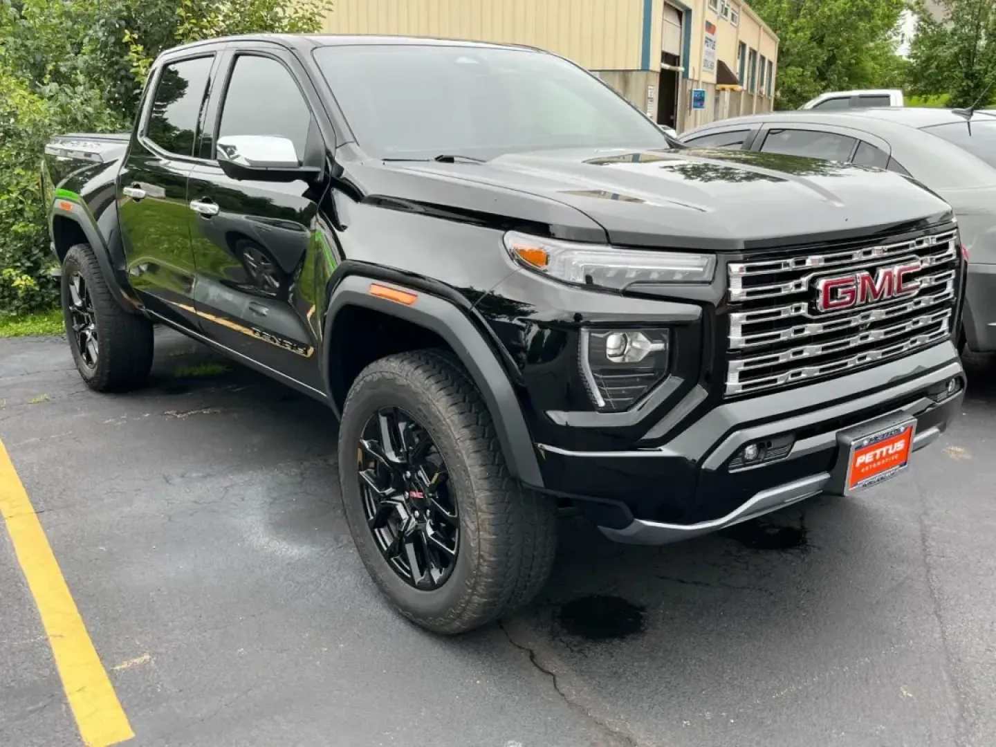 2024 /Jet Black/Teak Leather GMC Canyon Denali (1GTP6FEK5R1) with an TurboMax engine, Automatic transmission, located at 970 Woodlawn Dr., Farmington, MO, 63640, (573) 431-7800, 37.825642, -90.468674 - **Explore the 2024 GMC Canyon Denali: The Ultimate Companion for Your Adventures!**<br /> <br /> Are you ready to elevate your driving experience? The 2024 GMC Canyon Denali is your ticket to luxury and performance, making it the perfect vehicle for those who seek adventure without sacrificing comfo - Photo#0