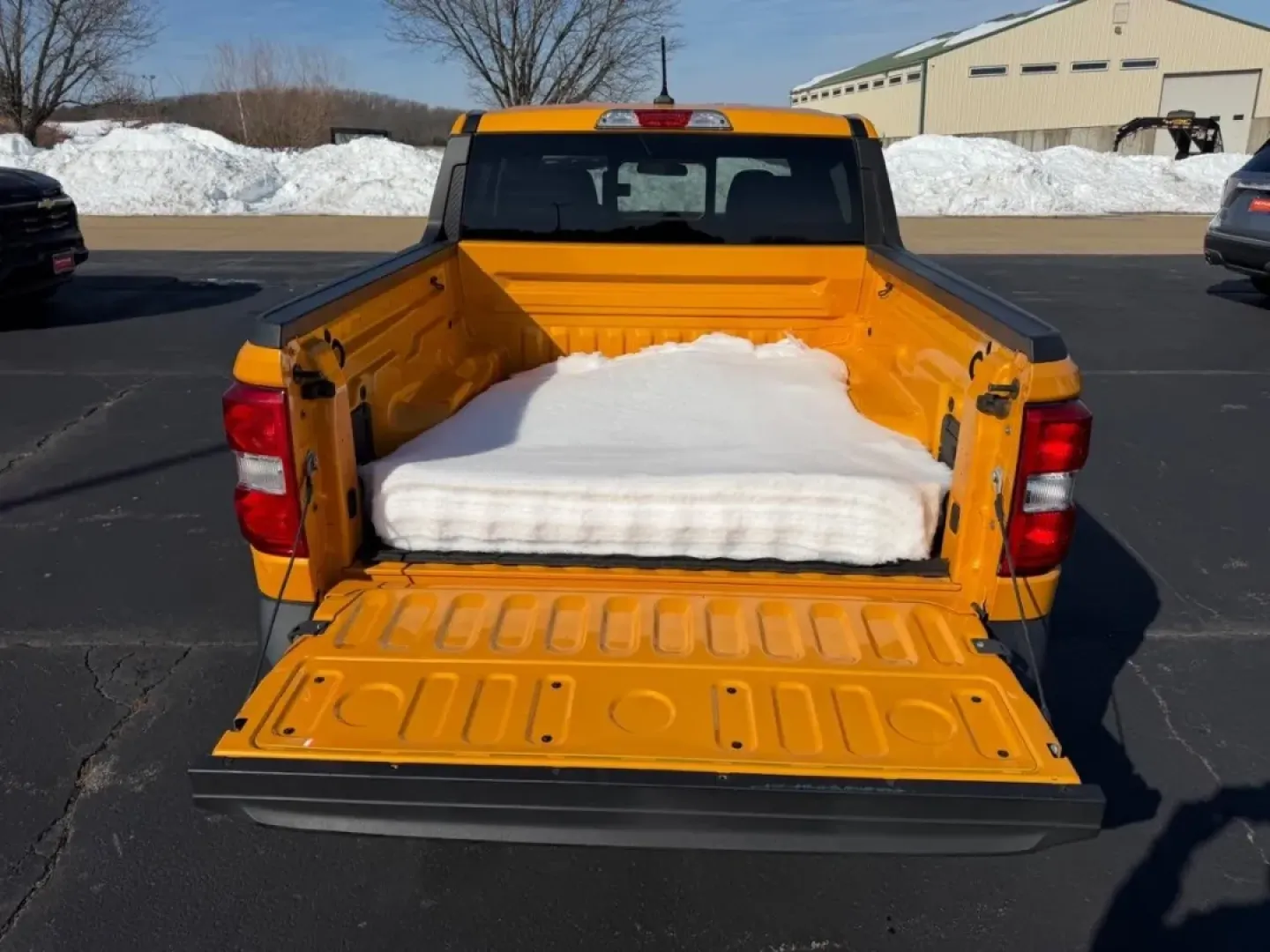 2022 /Navy Pier/Medium Slate Cloth Ford Maverick XLT (3FTTW8F95NR) with an 2.0L EcoBoost engine, Automatic transmission, located at 970 Woodlawn Dr., Farmington, MO, 63640, (573) 431-7800, 37.825642, -90.468674 - Looking for a versatile vehicle that seamlessly blends style, comfort, and functionality? The 2022 Ford Maverick XLT is the perfect choice for those who embrace a dynamic lifestyle-be it for daily commutes, weekend getaways, or family adventures. This striking truck, with its vibrant Cyber Orange Tr - Photo#4