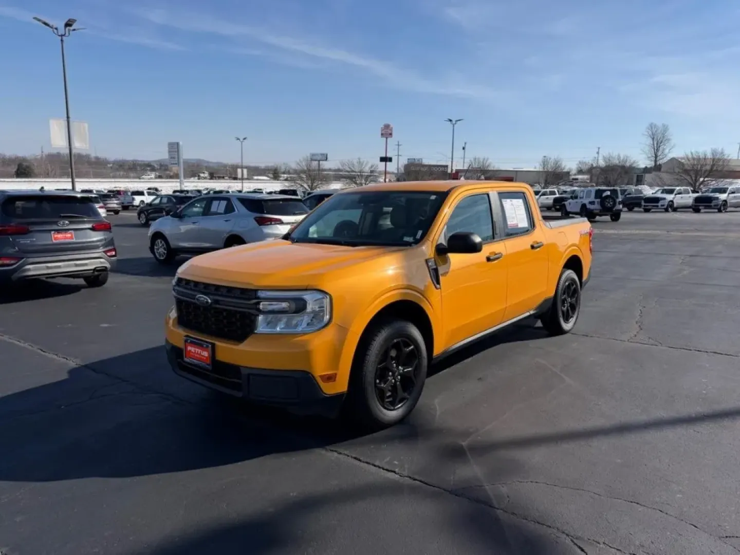 2022 /Navy Pier/Medium Slate Cloth Ford Maverick XLT (3FTTW8F95NR) with an 2.0L EcoBoost engine, Automatic transmission, located at 970 Woodlawn Dr., Farmington, MO, 63640, (573) 431-7800, 37.825642, -90.468674 - Looking for a versatile vehicle that seamlessly blends style, comfort, and functionality? The 2022 Ford Maverick XLT is the perfect choice for those who embrace a dynamic lifestyle-be it for daily commutes, weekend getaways, or family adventures. This striking truck, with its vibrant Cyber Orange Tr - Photo#6