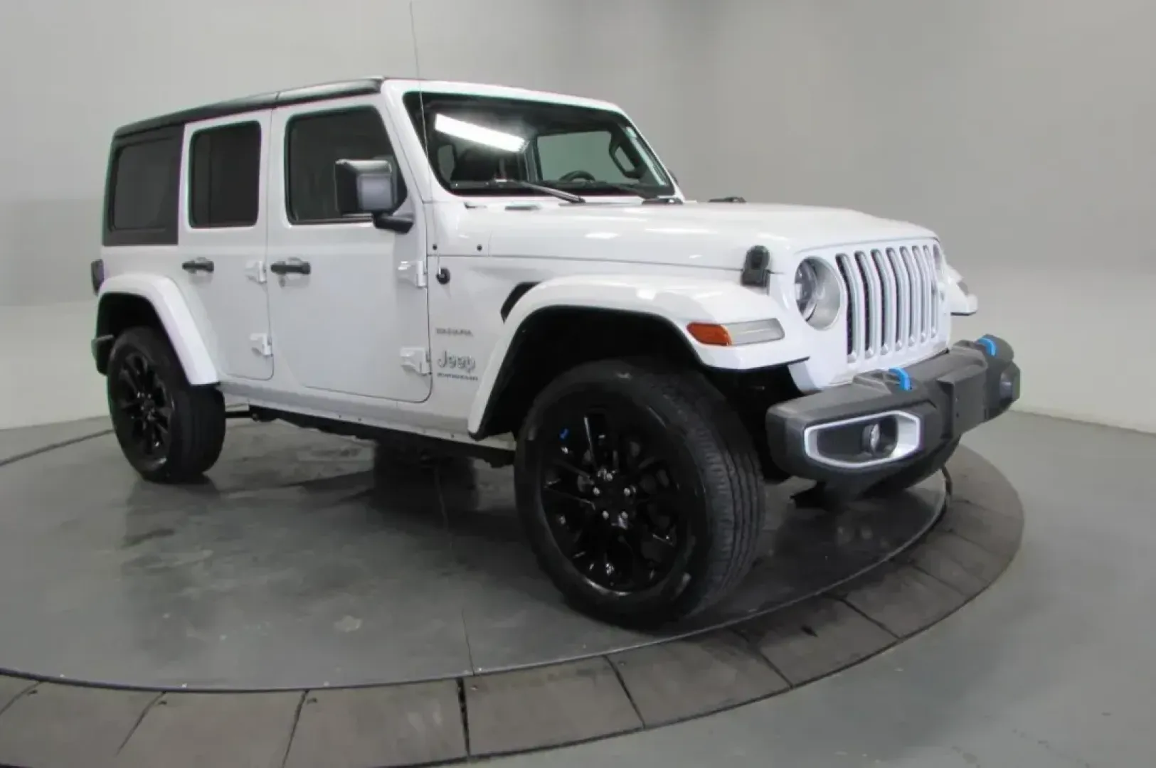 2023 /Dark Saddle/Black Jeep Wrangler Sahara 4xe (1C4JJXP68PW) with an Other engine, Automatic transmission, located at 12830 Highway 21, De Soto, MO, 63020, (636) 337-7777, 38.153099, -90.573624 - **Explore the Great Outdoors with the 2023 Jeep Wrangler Sahara 4xe The Ultimate Adventure Companion!**<br /> <br /> Are you ready to elevate your adventures and redefine your weekend getaways? Look no further than the 2023 Jeep Wrangler Sahara 4xe, the perfect SUV for those who crave exploration, - Photo#0