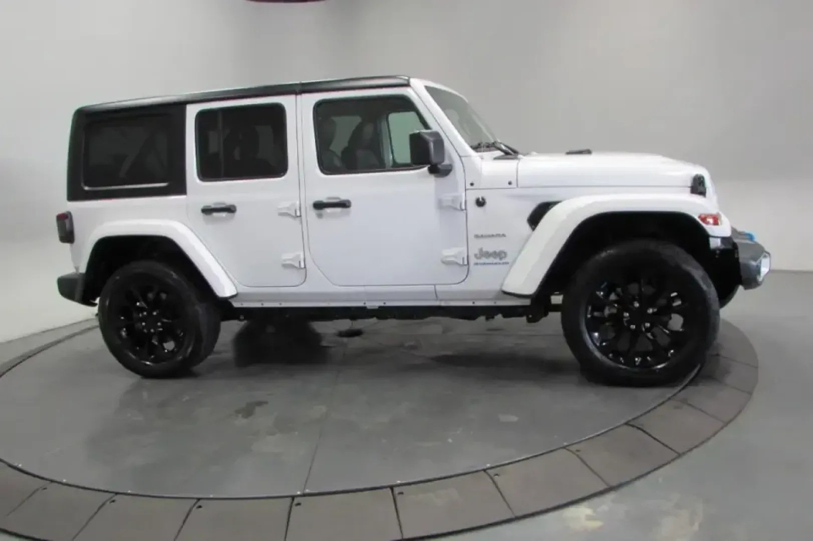 2023 /Black Jeep Wrangler Sahara 4xe (1C4JJXP68PW) with an 2.0L L4 DOHC 16V HYBRID engine, Automatic transmission, located at 12830 Highway 21, De Soto, MO, 63020, (636) 337-7777, 38.153099, -90.573624 - **Explore the Great Outdoors with the 2023 Jeep Wrangler Sahara 4xe The Ultimate Adventure Companion!**<br /> <br /> Are you ready to elevate your adventures and redefine your weekend getaways? Look no further than the 2023 Jeep Wrangler Sahara 4xe, the perfect SUV for those who crave exploration, - Photo#3