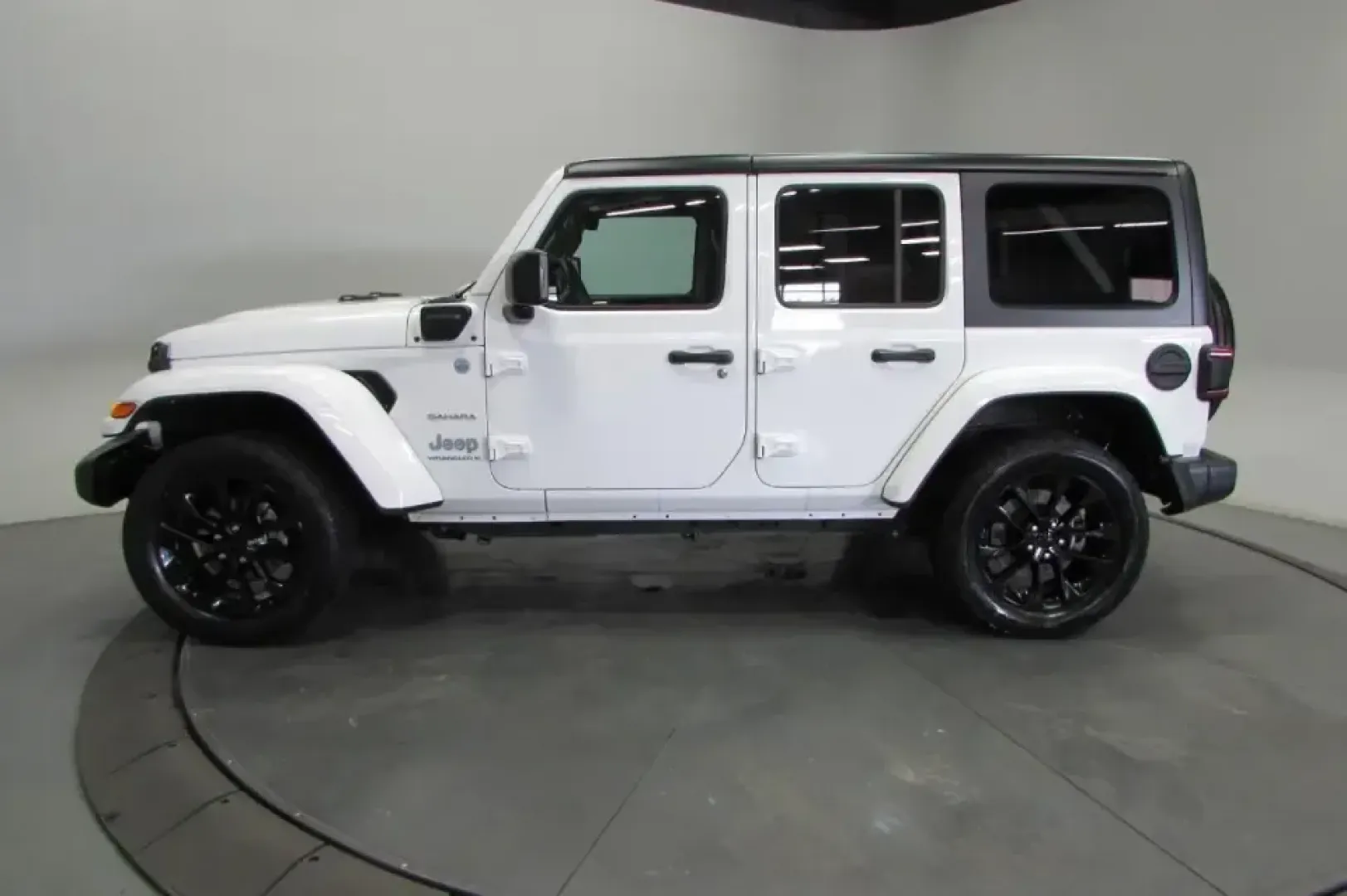 2023 /Black Jeep Wrangler Sahara 4xe (1C4JJXP68PW) with an 2.0L L4 DOHC 16V HYBRID engine, Automatic transmission, located at 12830 Highway 21, De Soto, MO, 63020, (636) 337-7777, 38.153099, -90.573624 - **Explore the Great Outdoors with the 2023 Jeep Wrangler Sahara 4xe The Ultimate Adventure Companion!**<br /> <br /> Are you ready to elevate your adventures and redefine your weekend getaways? Look no further than the 2023 Jeep Wrangler Sahara 4xe, the perfect SUV for those who crave exploration, - Photo#4
