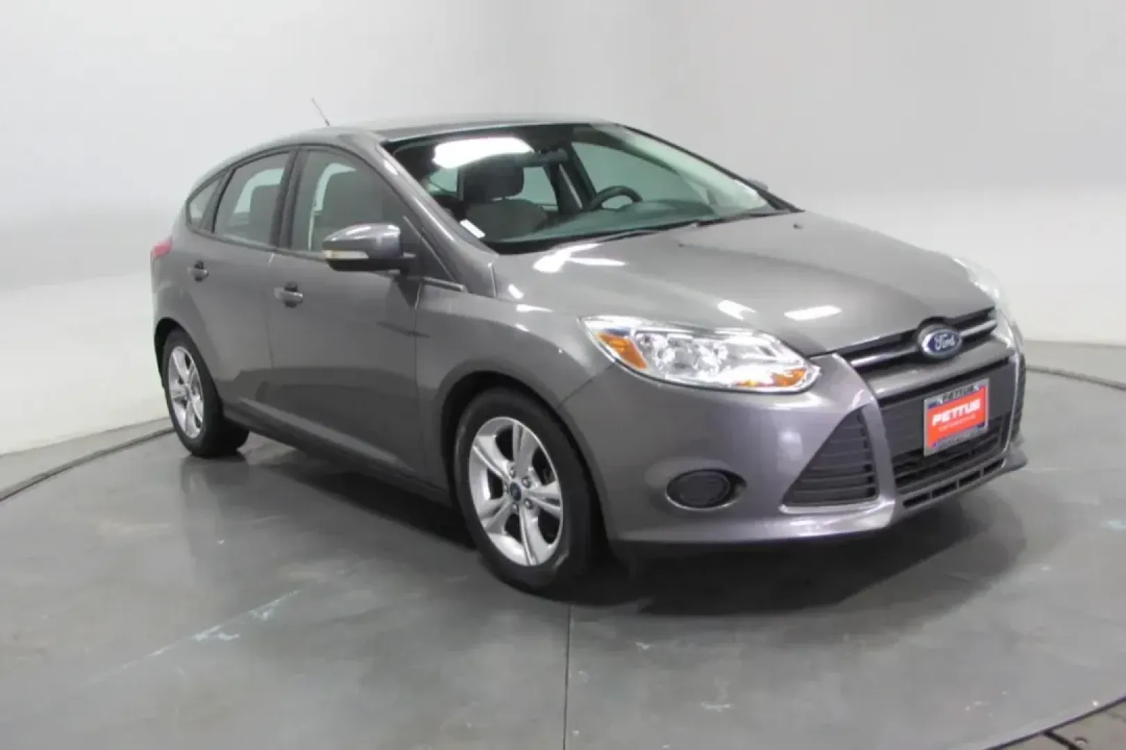 2013 /Medium Light Stone Cloth Ford Focus SE (1FADP3K22DL) with an Other engine, located at 12830 Highway 21, De Soto, MO, 63020, (636) 337-7777, 38.153099, -90.573624 - USED 2013 Ford Focus SE from Pettus Chrysler Dodge Jeep Ram De Soto, De Soto MO. - Photo#0