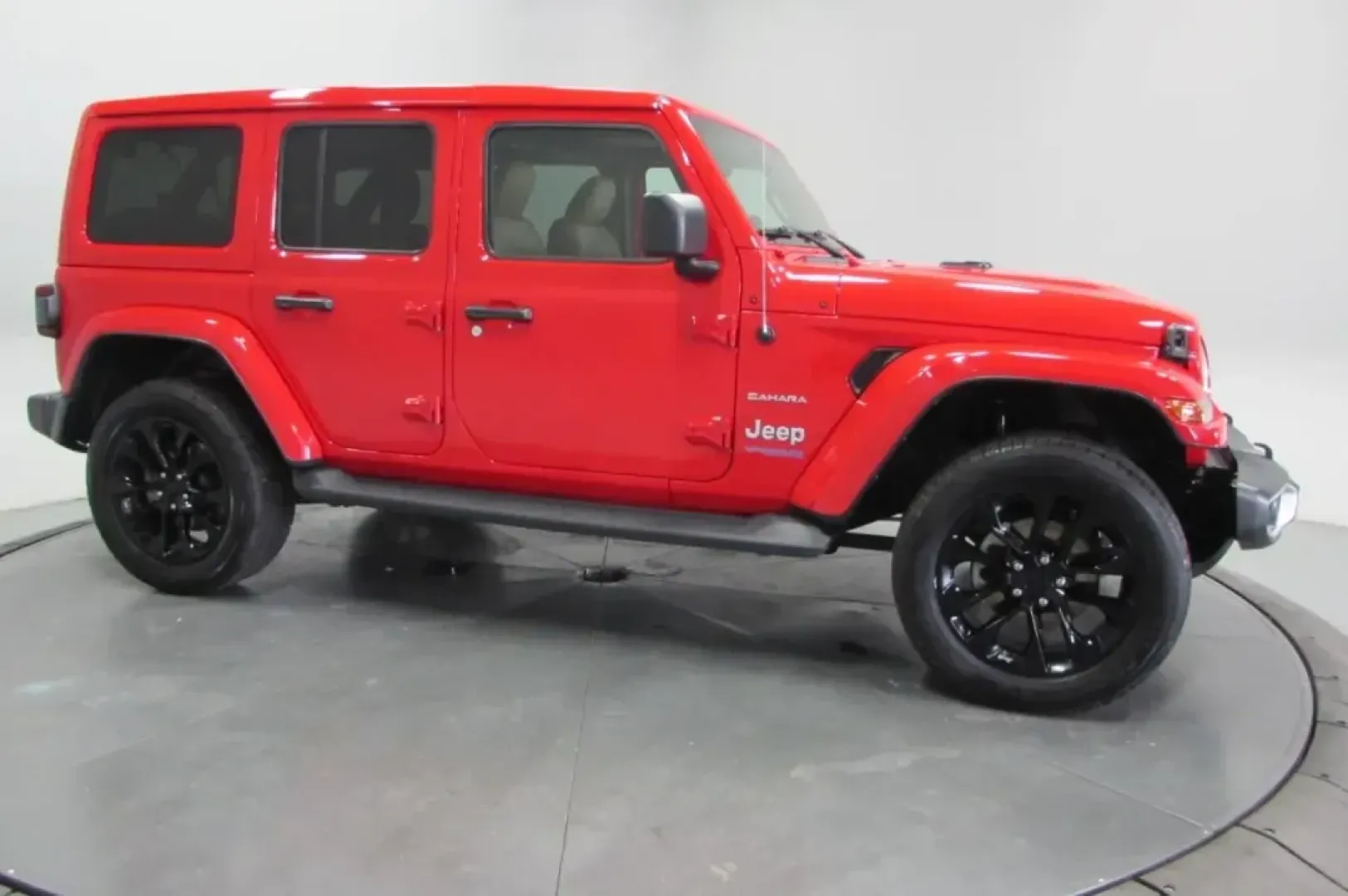 2021 /Dark Saddle/Black Leather Jeep Wrangler Unlimited Sahara 4xe (1C4JJXP64MW) with an Other engine, Automatic transmission, located at 12830 Highway 21, De Soto, MO, 63020, (636) 337-7777, 38.153099, -90.573624 - **Adventure Awaits: Explore the 2021 Jeep Wrangler Unlimited Sahara 4xe at Pettus CDJR DeSoto!**<br /> <br /> Are you ready to elevate your outdoor lifestyle or conquer the daily commute with confidence? The 2021 Jeep Wrangler Unlimited Sahara 4xe is the perfect companion for those who crave adventu - Photo#3