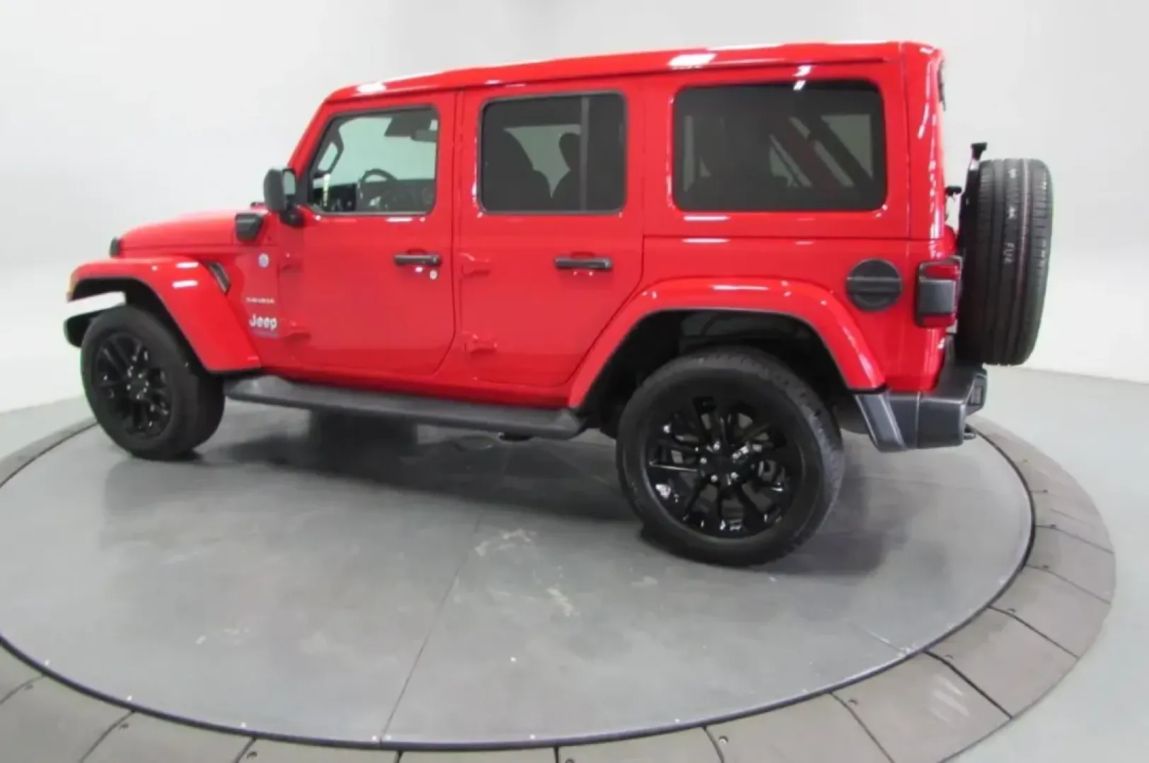 2021 /Dark Saddle/Black Leather Jeep Wrangler Unlimited Sahara 4xe (1C4JJXP64MW) with an Other engine, Automatic transmission, located at 12830 Highway 21, De Soto, MO, 63020, (636) 337-7777, 38.153099, -90.573624 - **Adventure Awaits: Explore the 2021 Jeep Wrangler Unlimited Sahara 4xe at Pettus CDJR DeSoto!**<br /> <br /> Are you ready to elevate your outdoor lifestyle or conquer the daily commute with confidence? The 2021 Jeep Wrangler Unlimited Sahara 4xe is the perfect companion for those who crave adventu - Photo#4