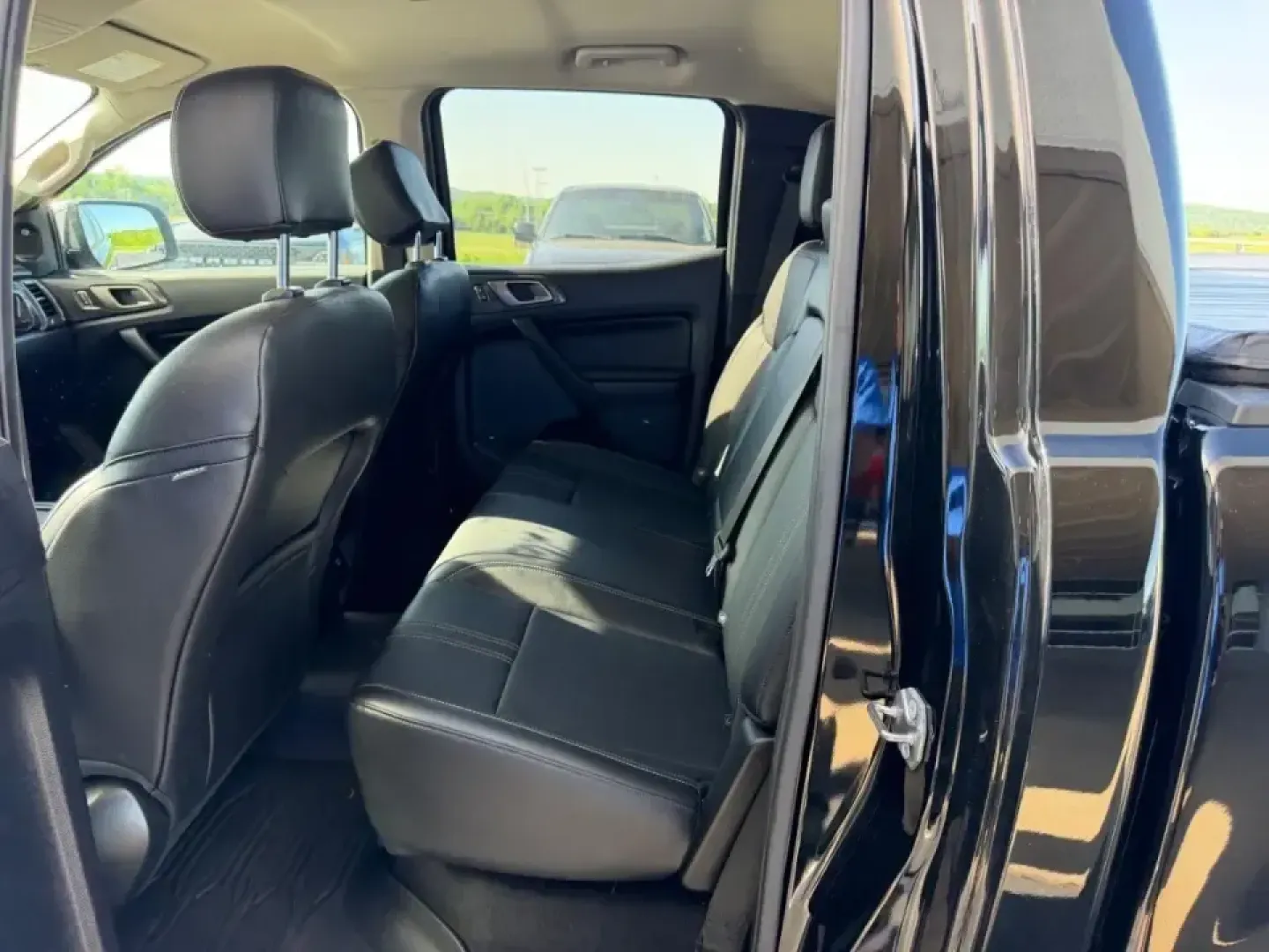 2019 /Ebony Leather Ford Ranger Lariat (1FTER4FH5KL) with an 2.3L EcoBoost engine, Automatic transmission, located at 141 Commercial Dr, Fredericktown, MO, 63645, (573) 783-6432, 37.570087, -90.320648 - Need a truck that can handle weekday commutes across Fredericktown and still be ready for a loaded-up weekend at Castor River Shut-Ins or a run down US-67? This 2019 Ford Ranger XL SuperCrew 4WD is built for real-life Missouri driving-room for friends or family, confidence in changing weather, and t - Photo#8
