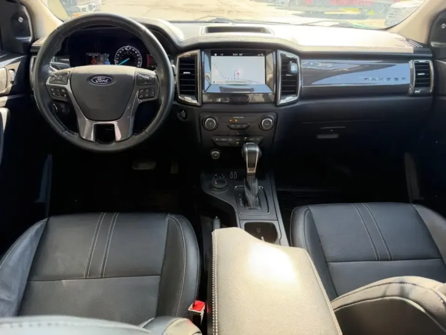 2019 /Ebony Leather Ford Ranger Lariat (1FTER4FH5KL) with an 2.3L EcoBoost engine, Automatic transmission, located at 141 Commercial Dr, Fredericktown, MO, 63645, (573) 783-6432, 37.570087, -90.320648 - Need a truck that can handle weekday commutes across Fredericktown and still be ready for a loaded-up weekend at Castor River Shut-Ins or a run down US-67? This 2019 Ford Ranger XL SuperCrew 4WD is built for real-life Missouri driving-room for friends or family, confidence in changing weather, and t - Photo#9