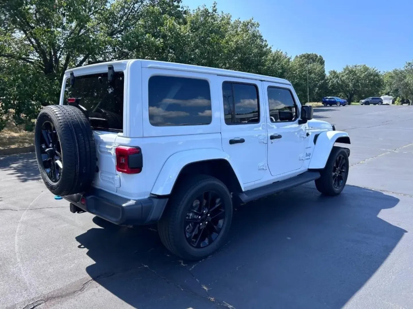 2022 /Black Leather Jeep Wrangler Unlimited Sahara 4xe (1C4JJXP68NW) with an 2.0L I4 DOHC DI Turbo PHEV engine, Automatic transmission, located at 970 Woodlawn Dr., Farmington, MO, 63640, (573) 431-7800, 37.825642, -90.468674 - ### Adventure Awaits with the 2022 Jeep Wrangler Unlimited Sahara 4xe!<br /> <br /> Are you ready to elevate your outdoor adventures and daily commuting with style and confidence? The 2022 Jeep Wrangler Unlimited Sahara 4xe is the perfect companion for those who crave the thrill of off-road explorat - Photo#2
