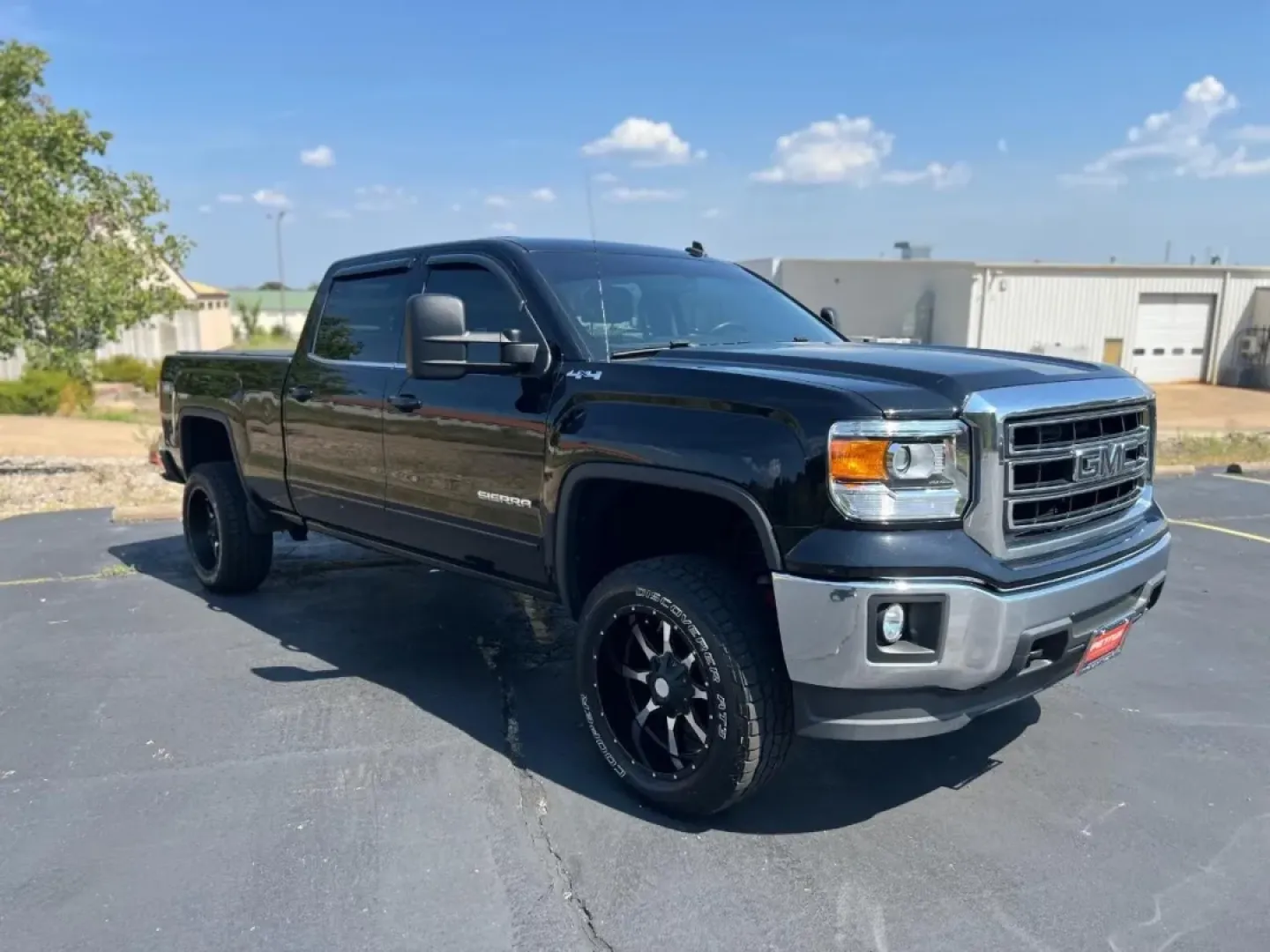 2014 /Jet Black/Dark Ash Cloth GMC Sierra 1500 4WD Crew Cab SLE (3GTU2UEC2EG) with an 5.3L engine, Automatic transmission, located at 970 Woodlawn Dr., Farmington, MO, 63640, (573) 431-7800, 37.825642, -90.468674 - **Unleash Your Adventurous Spirit with the 2014 GMC Sierra 1500 at Pettus CDJR Farmington!**<br /> <br /> Are you ready to elevate your weekend getaways and daily commutes? The 2014 GMC Sierra 1500 is not just a truck; it's a versatile companion designed to facilitate a lifestyle filled with adventu - Photo#0