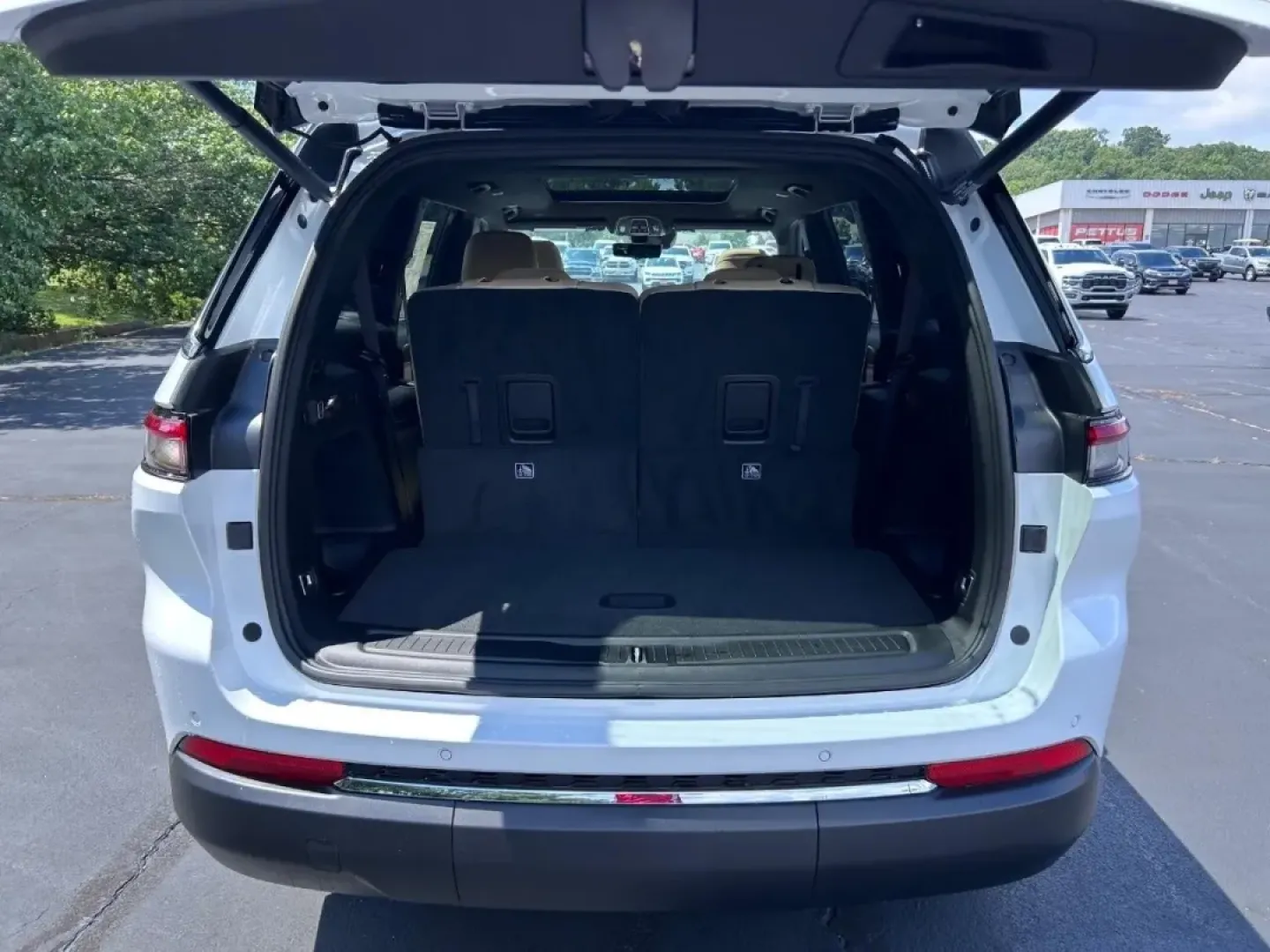 2025 /Wicker Beige/Black Leather Jeep Grand Cherokee Limited (1C4RJKBG5S8) with an 3.6L V6 24V VVT UPG I engine, located at 970 Woodlawn Dr., Farmington, MO, 63640, (573) 431-7800, 37.825642, -90.468674 - Explore the open road with confidence and style in the stunning 2025 Jeep Grand Cherokee L Limited, now available at Pettus CDJR Farmington. Located at 970 Woodlawn Drive in Farmington, MO, our OEM dealership specializes in quality used vehicles and is committed to helping you find the perfect match - Photo#4