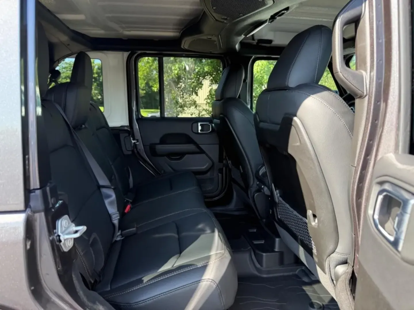 2025 /Black Leather Jeep Wrangler Sahara (1C4PJXEG2SW) with an 3.6L V6 engine, Automatic transmission, located at 970 Woodlawn Dr., Farmington, MO, 63640, (573) 431-7800, 37.825642, -90.468674 - Adventure awaits with the 2025 Jeep Wrangler Sahara, an SUV designed for those who crave both rugged exploration and everyday practicality. Perfect for weekend getaways to nearby destinations like the Mark Twain National Forest or leisurely drives through vibrant neighborhoods in Farmington, MO, thi - Photo#4