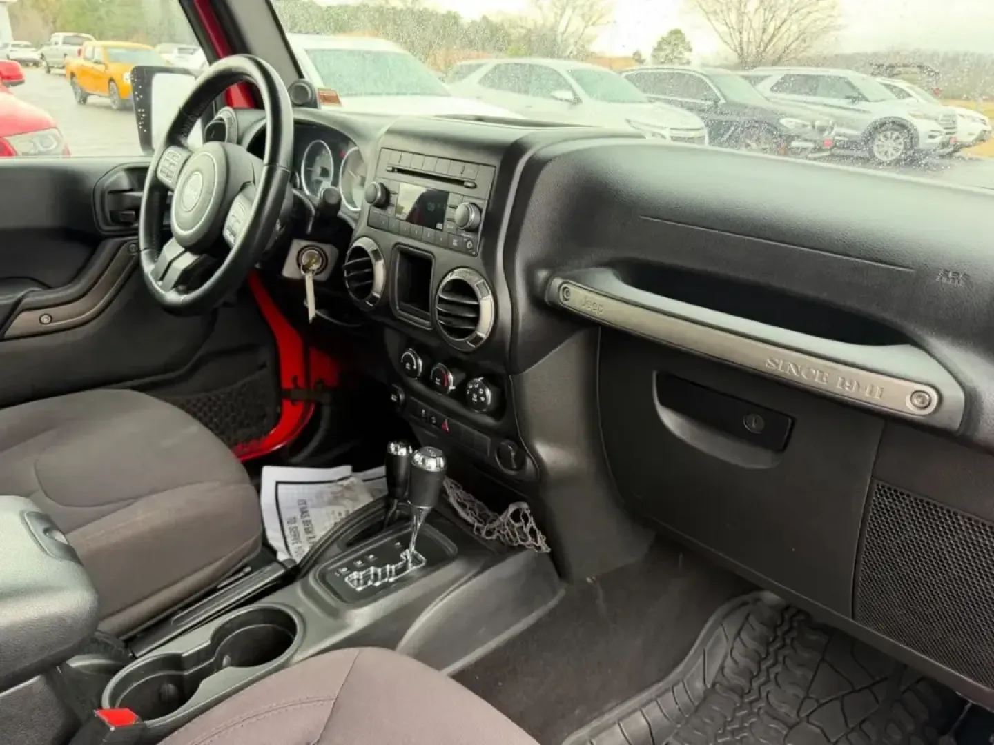 2014 /Black Cloth Jeep Wrangler Willys Wheeler (1C4AJWAG4EL) with an 3.6L V6 24V VVT engine, Automatic transmission, located at 970 Woodlawn Dr., Farmington, MO, 63640, (573) 431-7800, 37.825642, -90.468674 - Discover the thrill of adventure with this outstanding 2014 Jeep Wrangler Willys Wheeler, the perfect companion for weekend escapades and outdoor enthusiasts! Designed for those who crave off-road excitement and versatility, this SUV offers a unique blend of rugged capability and modern comforts. Wh - Photo#9