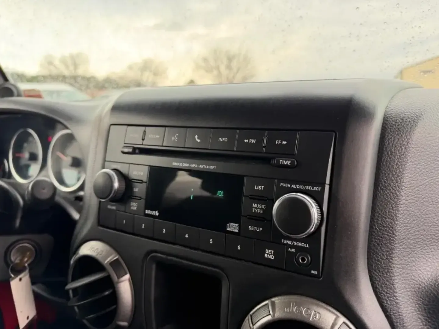 2014 /Black Cloth Jeep Wrangler Willys Wheeler (1C4AJWAG4EL) with an 3.6L V6 24V VVT engine, Automatic transmission, located at 970 Woodlawn Dr., Farmington, MO, 63640, (573) 431-7800, 37.825642, -90.468674 - Discover the thrill of adventure with this outstanding 2014 Jeep Wrangler Willys Wheeler, the perfect companion for weekend escapades and outdoor enthusiasts! Designed for those who crave off-road excitement and versatility, this SUV offers a unique blend of rugged capability and modern comforts. Wh - Photo#13