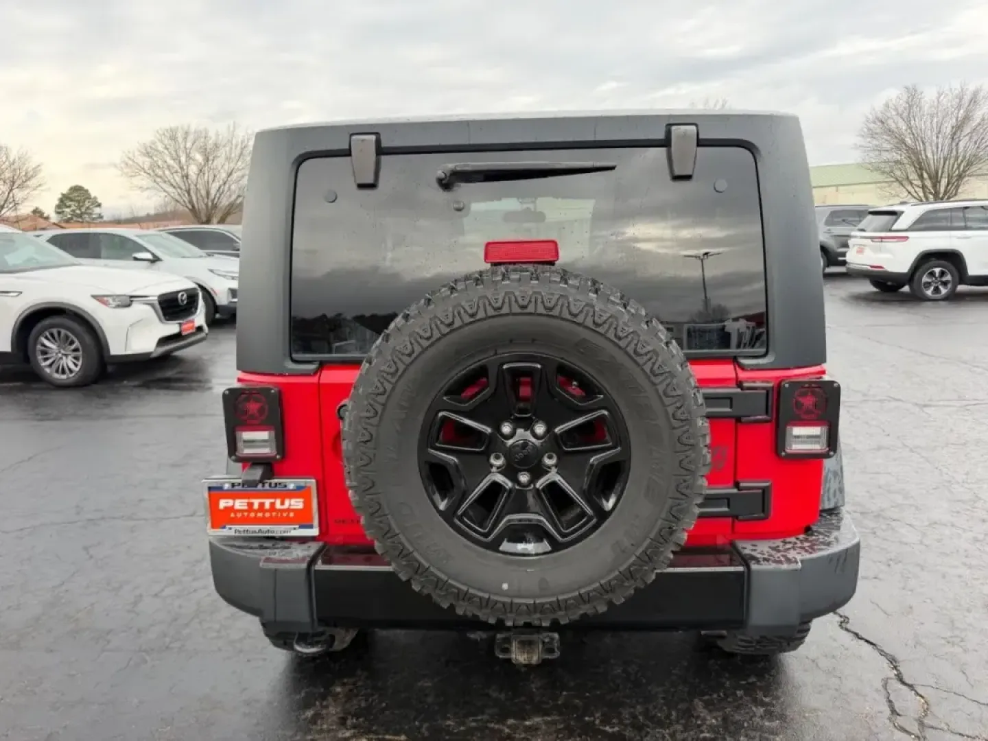 2014 /Black Cloth Jeep Wrangler Willys Wheeler (1C4AJWAG4EL) with an 3.6L V6 24V VVT engine, Automatic transmission, located at 970 Woodlawn Dr., Farmington, MO, 63640, (573) 431-7800, 37.825642, -90.468674 - Discover the thrill of adventure with this outstanding 2014 Jeep Wrangler Willys Wheeler, the perfect companion for weekend escapades and outdoor enthusiasts! Designed for those who crave off-road excitement and versatility, this SUV offers a unique blend of rugged capability and modern comforts. Wh - Photo#3