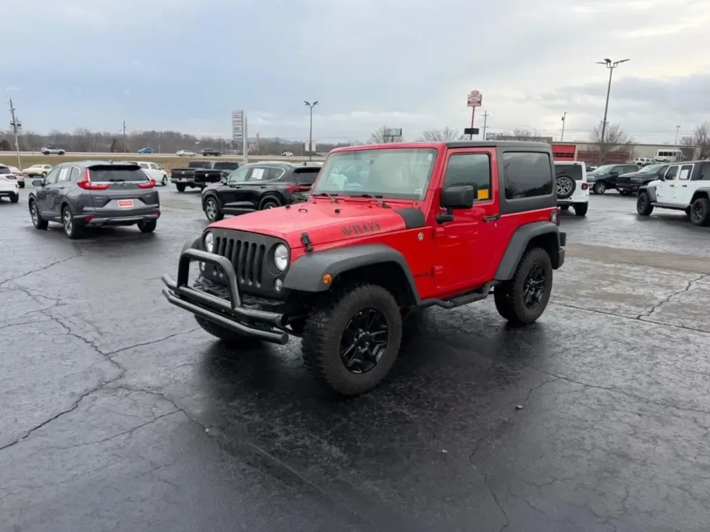 2014 /Black Cloth Jeep Wrangler Willys Wheeler (1C4AJWAG4EL) with an 3.6L V6 24V VVT engine, Automatic transmission, located at 970 Woodlawn Dr., Farmington, MO, 63640, (573) 431-7800, 37.825642, -90.468674 - Discover the thrill of adventure with this outstanding 2014 Jeep Wrangler Willys Wheeler, the perfect companion for weekend escapades and outdoor enthusiasts! Designed for those who crave off-road excitement and versatility, this SUV offers a unique blend of rugged capability and modern comforts. Wh - Photo#6