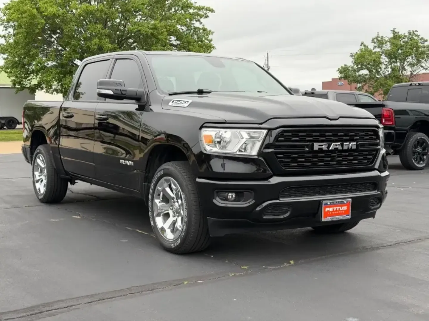 2022 /Black Cloth Ram 1500 4WD Big Horn Crew Cab (1C6SRFFT7NN) with an 5.7L engine, Automatic transmission, located at 970 Woodlawn Dr., Farmington, MO, 63640, (573) 431-7800, 37.825642, -90.468674 - Weekend projects, lake-day towing, and winter commutes in the Missouri hills all call for a truck that can switch roles without drama-and this **2022 Ram 1500 Big Horn/Lone Star 4x4** is built for exactly that lifestyle. Finished in **Diamond Black** with a **Black** interior, this full-size pickup - Photo#0