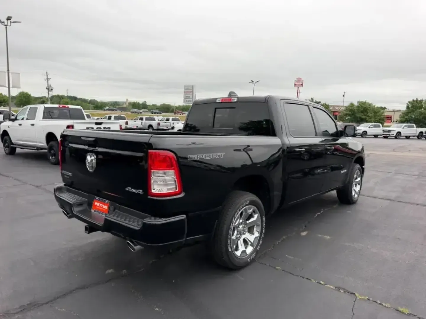 2022 /Black Cloth Ram 1500 4WD Big Horn Crew Cab (1C6SRFFT7NN) with an 5.7L engine, Automatic transmission, located at 970 Woodlawn Dr., Farmington, MO, 63640, (573) 431-7800, 37.825642, -90.468674 - Weekend projects, lake-day towing, and winter commutes in the Missouri hills all call for a truck that can switch roles without drama-and this **2022 Ram 1500 Big Horn/Lone Star 4x4** is built for exactly that lifestyle. Finished in **Diamond Black** with a **Black** interior, this full-size pickup - Photo#2
