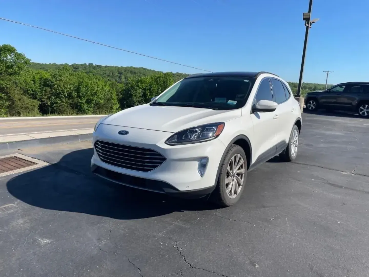 2021 /Ebony/Sandstone Leather Trimme Ford Escape Titanium (1FMCU9J95MU) with an Other engine, Automatic transmission, located at 12836 Highway 21, De Soto, MO, 63020, (636) 337-7777, 38.151867, -90.575615 - USED 2021 Ford Escape Titanium from Pettus Ford De Soto, De Soto MO. - Photo#0