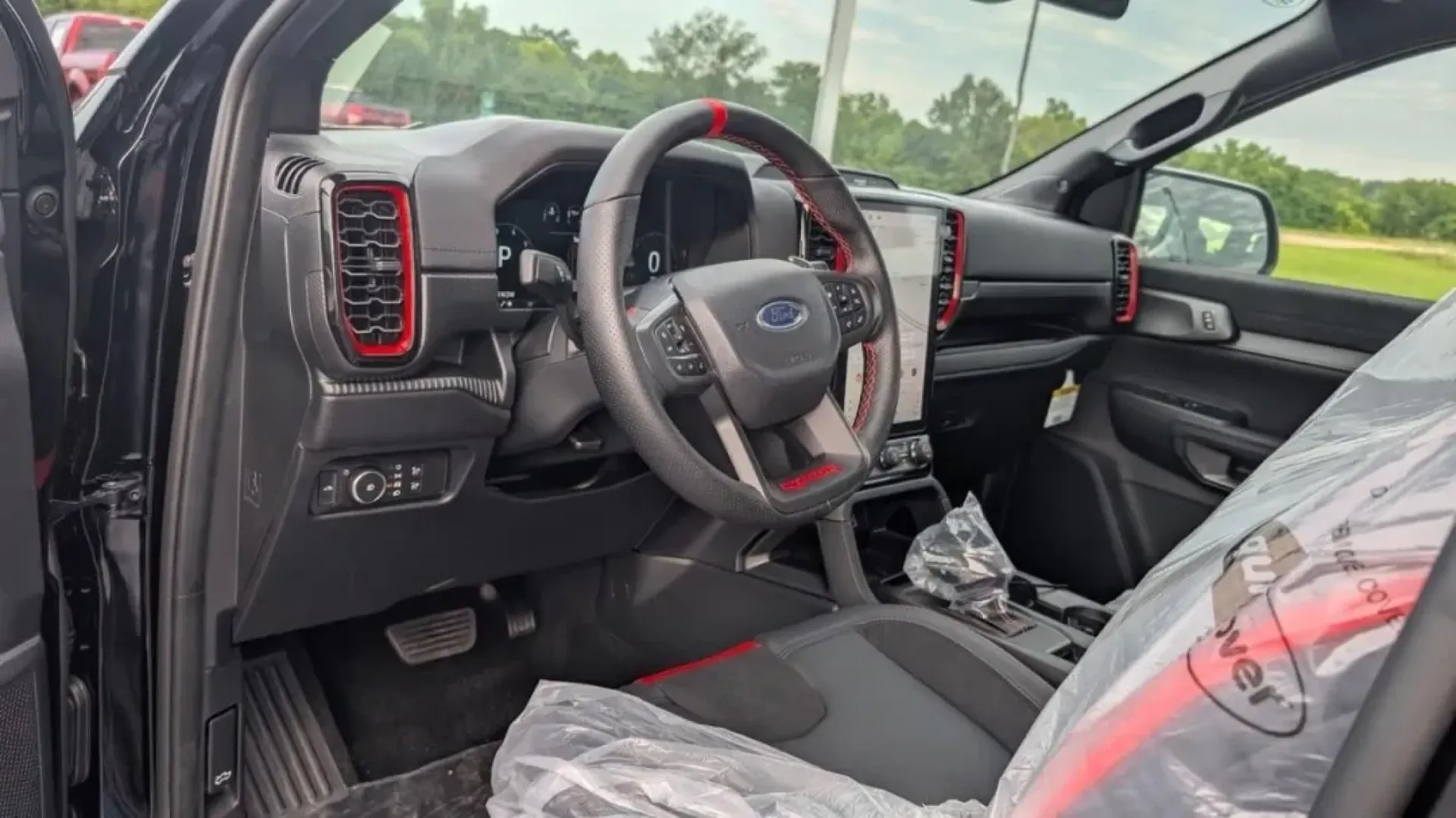 2025 /Ebony Leather Trimmed Ford Ranger Raptor (1FTER4LR7SL) with an 3.0L EcoBoost V6 engine, Automatic transmission, located at 141 Commercial Dr, Fredericktown, MO, 63645, (573) 783-6432, 37.570087, -90.320648 - Looking for the perfect vehicle that can handle your adventurous lifestyle while providing comfort and reliability? Look no further than the 2025 Ford Ranger Raptor available at Pettus Ford Fredericktown. With its rugged design and powerful capabilities, this truck is not just a mode of transportati - Photo#3