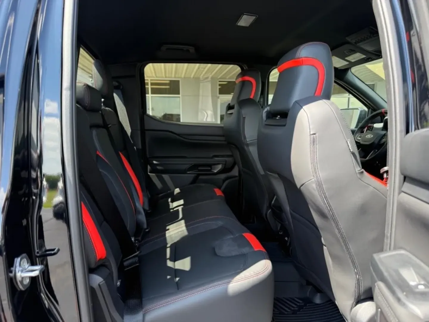 2025 /Ebony Leather Trimmed Ford Ranger Raptor (1FTER4LR7SL) with an 3.0L EcoBoost V6 engine, Automatic transmission, located at 141 Commercial Dr, Fredericktown, MO, 63645, (573) 783-6432, 37.570087, -90.320648 - Looking for the perfect vehicle that can handle your adventurous lifestyle while providing comfort and reliability? Look no further than the 2025 Ford Ranger Raptor available at Pettus Ford Fredericktown. With its rugged design and powerful capabilities, this truck is not just a mode of transportati - Photo#5