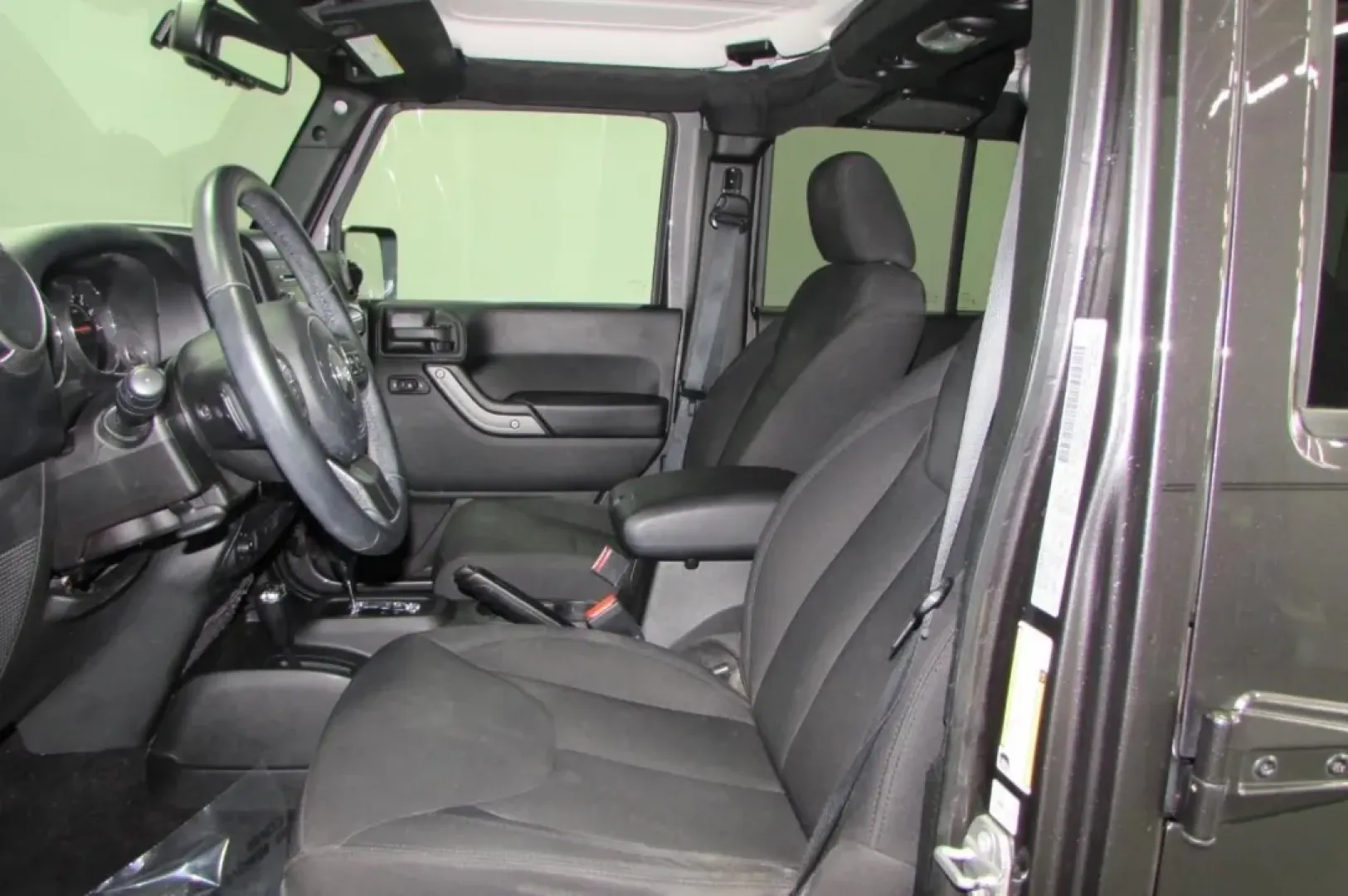 2017 /Black Cloth Jeep Wrangler Unlimited Sport (1C4BJWDG9HL) with an Other engine, located at 12830 Highway 21, De Soto, MO, 63020, (636) 337-7777, 38.153099, -90.573624 - **Adventure Awaits: Discover the 2017 Jeep Wrangler at Pettus CDJR DeSoto!**<br /> <br /> Are you ready to embrace the great outdoors? The 2017 Jeep Wrangler is your perfect companion for weekend adventures, making it an exceptional choice for those who love to explore nature's wonders. From winding - Photo#12