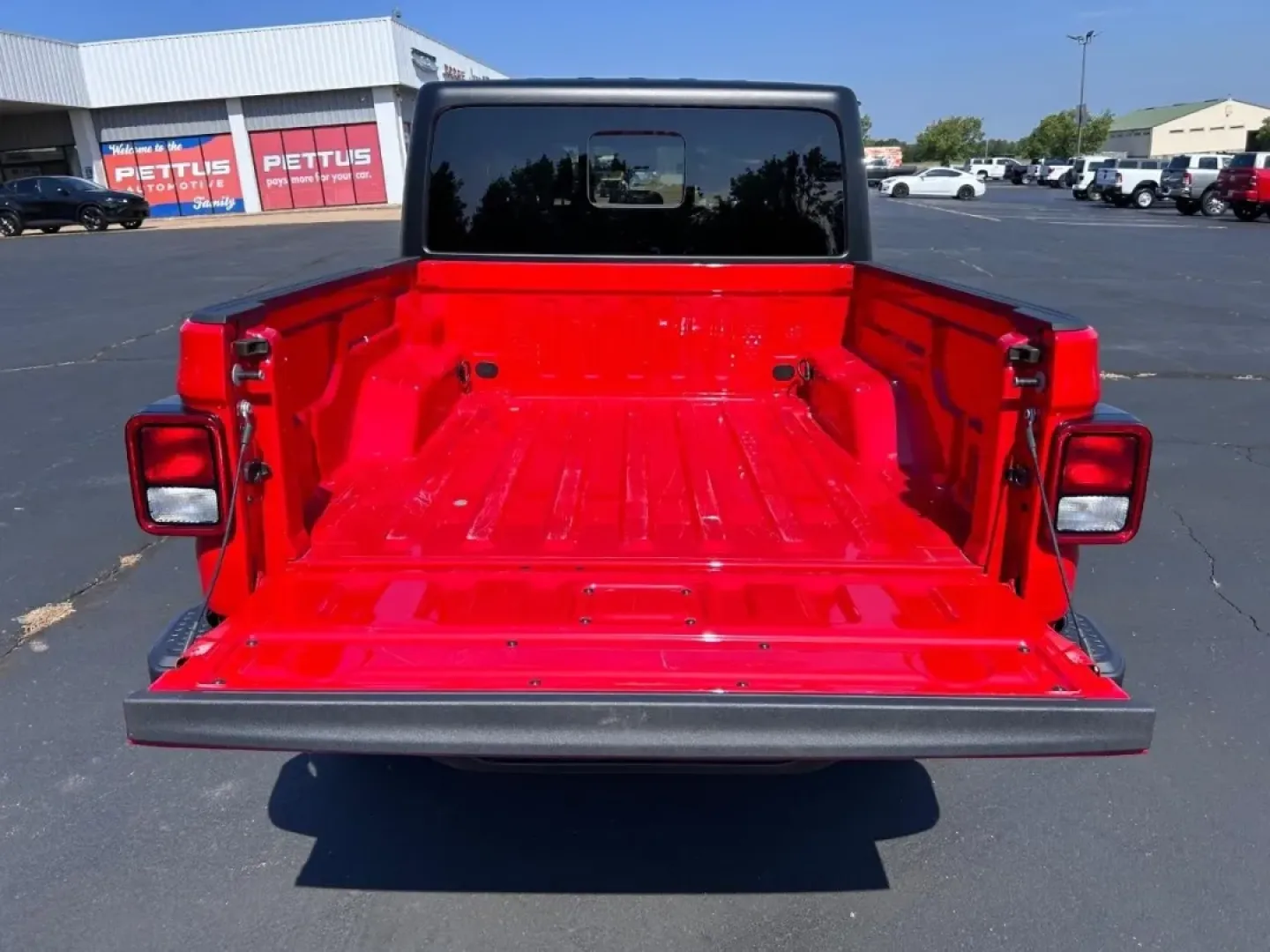 2024 /Black Cloth Jeep Gladiator Sport (1C6HJTAG6RL) with an 3.6L V6 24V VVT UPG I engine, located at 970 Woodlawn Dr., Farmington, MO, 63640, (573) 431-7800, 37.825642, -90.468674 - Are you ready to elevate your adventures and embrace a lifestyle filled with excitement and exploration? Look no further than the 2024 Jeep Gladiator, available now at Pettus CDJR Farmington! Whether you're a weekend warrior, a daily commuter seeking a rugged yet comfortable ride, or a growing famil - Photo#4