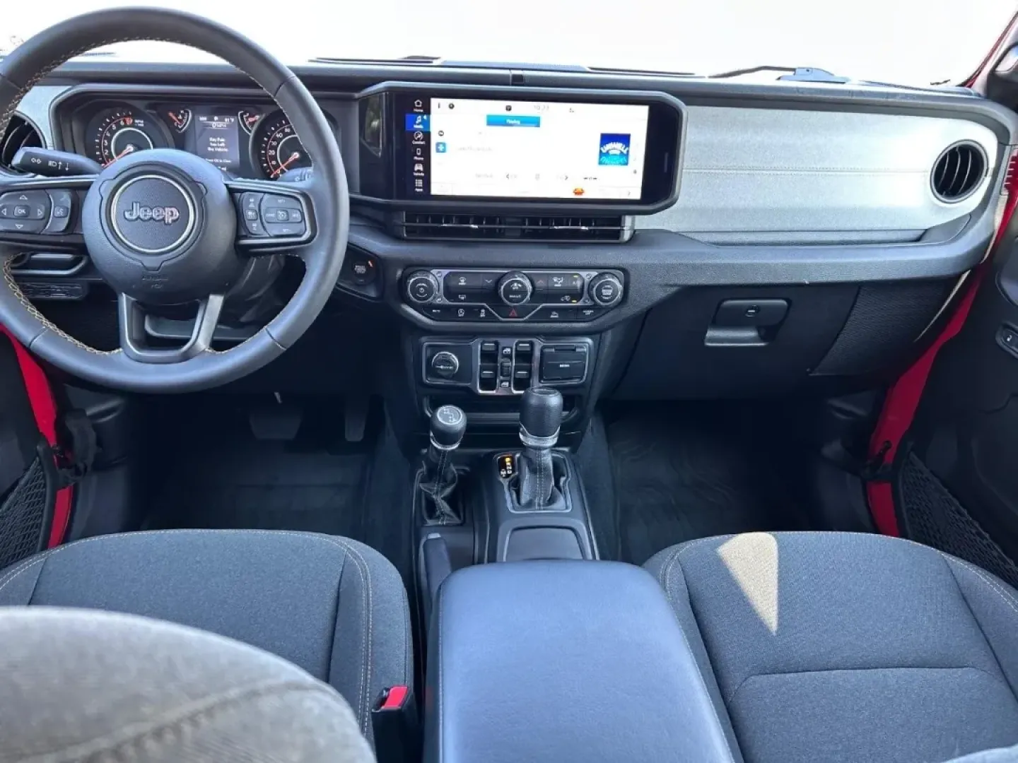 2024 /Black Cloth Jeep Gladiator Sport (1C6HJTAG6RL) with an 3.6L V6 24V VVT UPG I engine, located at 970 Woodlawn Dr., Farmington, MO, 63640, (573) 431-7800, 37.825642, -90.468674 - Are you ready to elevate your adventures and embrace a lifestyle filled with excitement and exploration? Look no further than the 2024 Jeep Gladiator, available now at Pettus CDJR Farmington! Whether you're a weekend warrior, a daily commuter seeking a rugged yet comfortable ride, or a growing famil - Photo#9