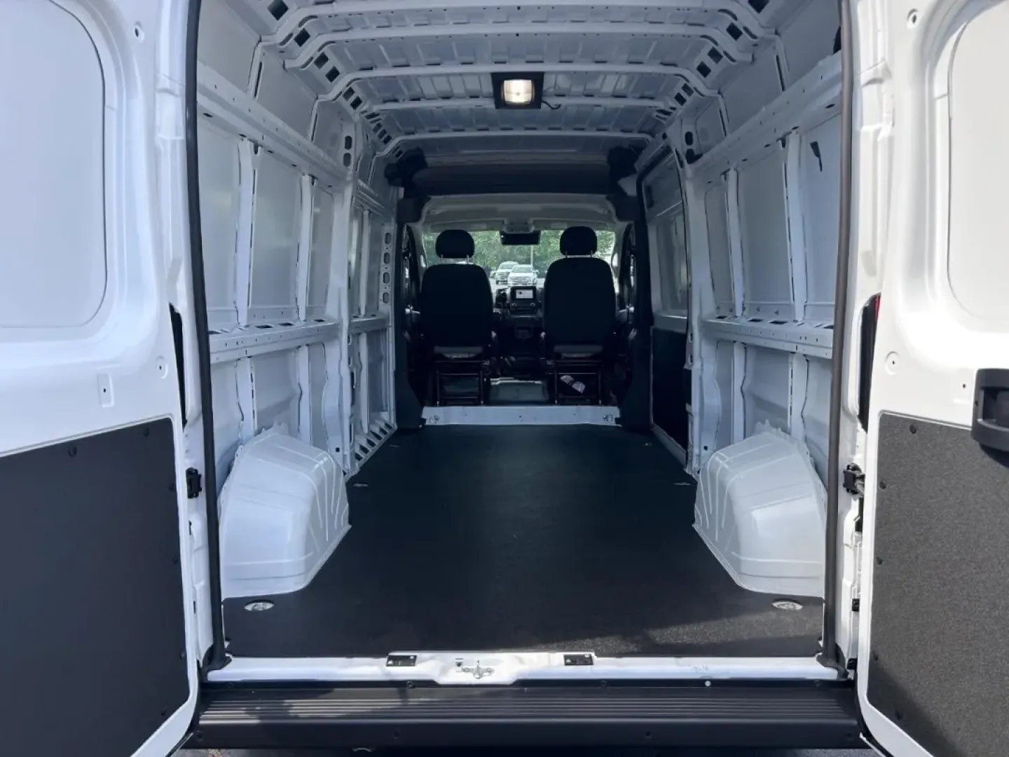 2025 /Black Leather Ram ProMaster 2500 High Roof (3C6LRVDGXSE) with an 3.6L V6 24V VVT engine, Automatic transmission, located at 970 Woodlawn Dr., Farmington, MO, 63640, (573) 431-7800, 37.825642, -90.468674 - Looking for the perfect vehicle to elevate your business or weekend adventures? The 2025 Ram ProMaster Cargo Van is your answer, offering a blend of versatility and functionality that meets the demands of any hardworking professional or adventurous spirit. Whether you're outfitting your work vehicle - Photo#4