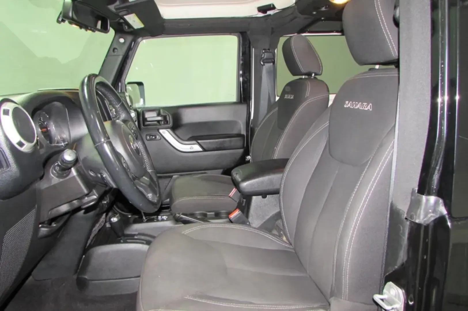 2017 /Black Cloth Jeep Wrangler Sahara (1C4AJWBG4HL) with an Other engine, located at 12830 Highway 21, De Soto, MO, 63020, (636) 337-7777, 38.153099, -90.573624 - **Explore the Great Outdoors with the 2017 Jeep Wrangler from Pettus CDJR DeSoto!**<br /> <br /> Are you ready to embark on thrilling weekend adventures or tackle your daily commute with style? The 2017 Jeep Wrangler is your perfect companion for both. Designed for those who crave excitement and fun - Photo#11