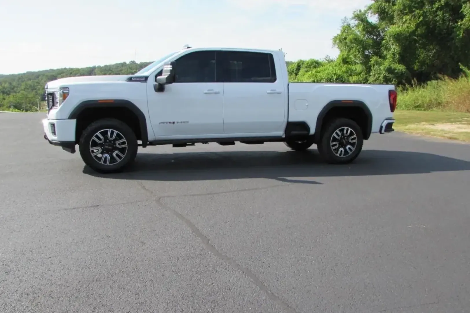 2022 /Jet Black With Kalahari Accents GMC Sierra 2500HD AT4 (1GT49PEY8NF) with an Other engine, located at 12830 Highway 21, De Soto, MO, 63020, (636) 337-7777, 38.153099, -90.573624 - Are you ready to elevate your adventures and tackle any terrain with the power and reliability of a truck? Look no further than this exceptional 2022 GMC Sierra 2500HD, now available at Pettus CDJR DeSoto. Whether you're hauling heavy loads for your business or taking the family on a weekend getaway - Photo#3