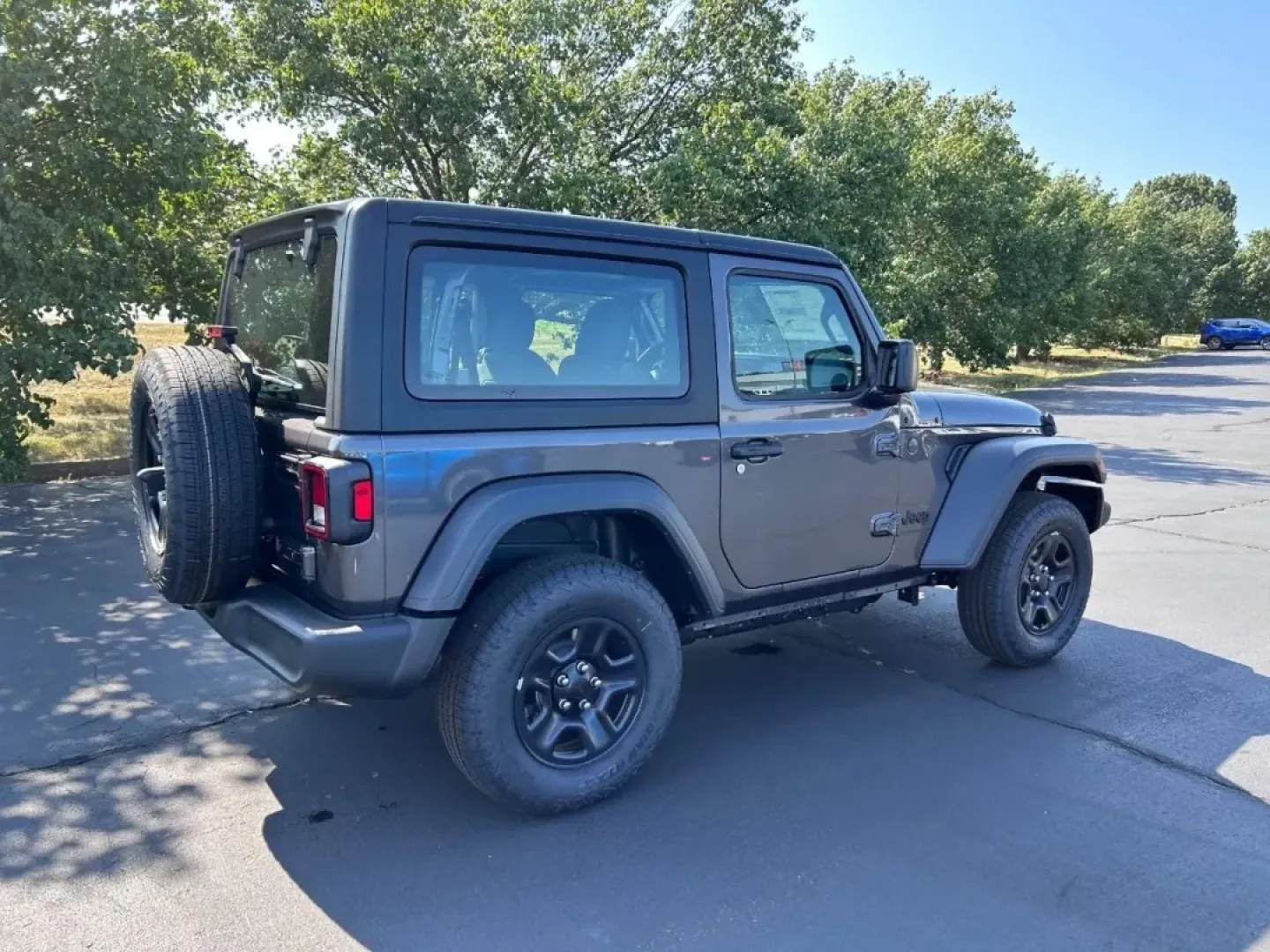 2025 /Black Cloth Jeep Wrangler Sport (1C4PJXAG6SW) with an 3.6L V6 24V VVT UPG I engine, located at 970 Woodlawn Dr., Farmington, MO, 63640, (573) 431-7800, 37.825642, -90.468674 - **Unleash Your Adventurous Spirit with the 2025 Jeep Wrangler!**<br /> <br /> Are you ready to elevate your outdoor adventures while ensuring your daily commute remains a breeze? The 2025 Jeep Wrangler, now available at Pettus CDJR Farmington, is the perfect blend of rugged capability and urban func - Photo#2