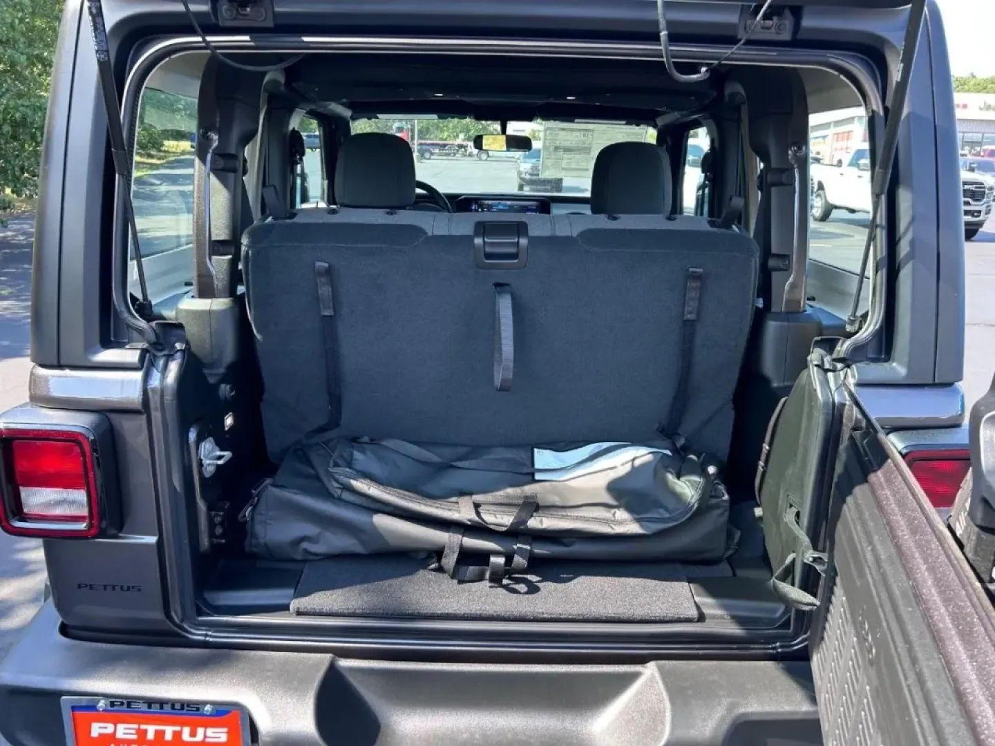 2025 /Black Cloth Jeep Wrangler Sport (1C4PJXAG6SW) with an 3.6L V6 24V VVT UPG I engine, located at 970 Woodlawn Dr., Farmington, MO, 63640, (573) 431-7800, 37.825642, -90.468674 - **Unleash Your Adventurous Spirit with the 2025 Jeep Wrangler!**<br /> <br /> Are you ready to elevate your outdoor adventures while ensuring your daily commute remains a breeze? The 2025 Jeep Wrangler, now available at Pettus CDJR Farmington, is the perfect blend of rugged capability and urban func - Photo#4