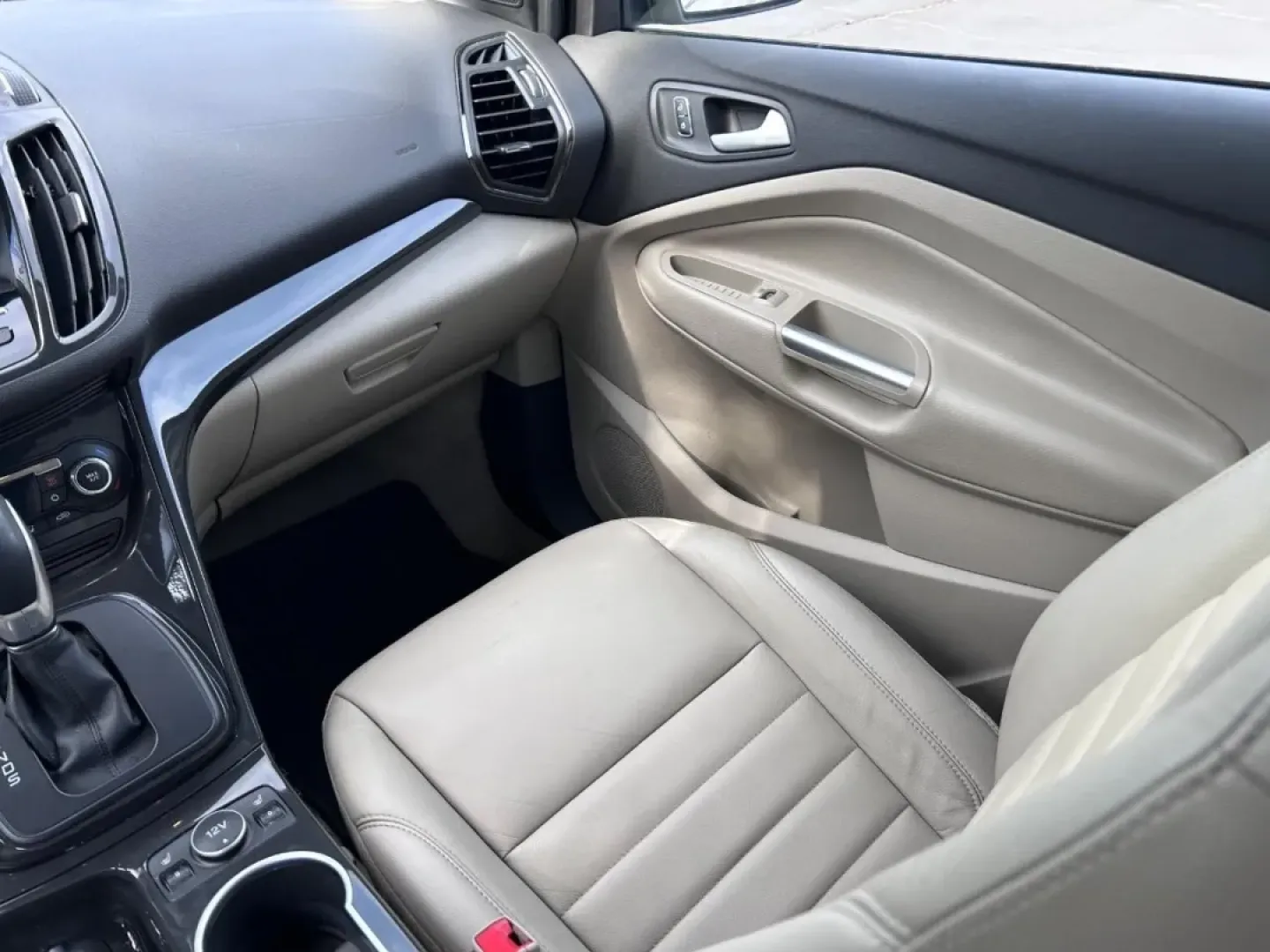 2016 /Medium Light Stone Leather Ford Escape Titanium (1FMCU0JX8GU) with an 1.6L EcoBoost engine, Automatic transmission, located at 970 Woodlawn Dr., Farmington, MO, 63640, (573) 431-7800, 37.825642, -90.468674 - Are you ready for your next adventure? Whether you're commuting to work, taking the family on a weekend getaway, or exploring the scenic routes around Farmington, the 2016 Ford Escape Titanium is the perfect companion for all your journeys. With its spacious interior, advanced technology, and except - Photo#18