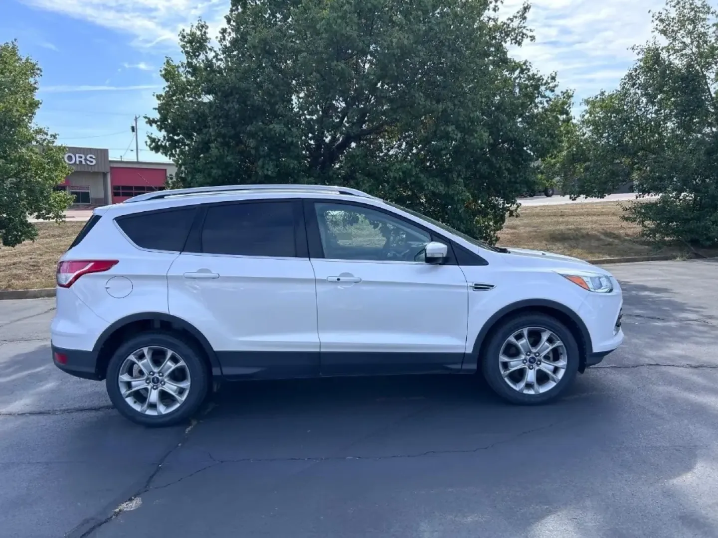 2016 /Medium Light Stone Leather Ford Escape Titanium (1FMCU0JX8GU) with an 1.6L EcoBoost engine, Automatic transmission, located at 970 Woodlawn Dr., Farmington, MO, 63640, (573) 431-7800, 37.825642, -90.468674 - Are you ready for your next adventure? Whether you're commuting to work, taking the family on a weekend getaway, or exploring the scenic routes around Farmington, the 2016 Ford Escape Titanium is the perfect companion for all your journeys. With its spacious interior, advanced technology, and except - Photo#1