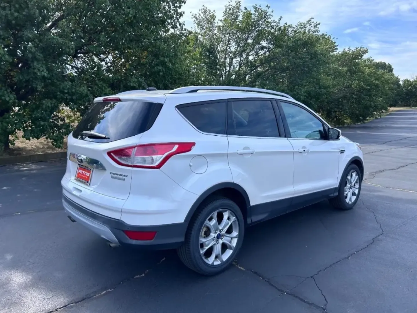 2016 /Medium Light Stone Leather Ford Escape Titanium (1FMCU0JX8GU) with an 1.6L EcoBoost engine, Automatic transmission, located at 970 Woodlawn Dr., Farmington, MO, 63640, (573) 431-7800, 37.825642, -90.468674 - Are you ready for your next adventure? Whether you're commuting to work, taking the family on a weekend getaway, or exploring the scenic routes around Farmington, the 2016 Ford Escape Titanium is the perfect companion for all your journeys. With its spacious interior, advanced technology, and except - Photo#2