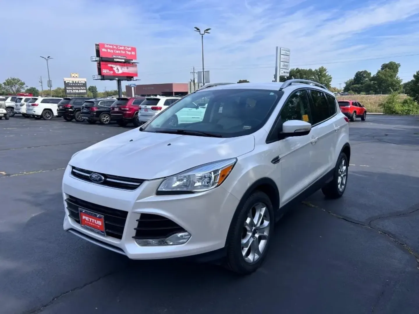 2016 /Medium Light Stone Leather Ford Escape Titanium (1FMCU0JX8GU) with an 1.6L EcoBoost engine, Automatic transmission, located at 970 Woodlawn Dr., Farmington, MO, 63640, (573) 431-7800, 37.825642, -90.468674 - Are you ready for your next adventure? Whether you're commuting to work, taking the family on a weekend getaway, or exploring the scenic routes around Farmington, the 2016 Ford Escape Titanium is the perfect companion for all your journeys. With its spacious interior, advanced technology, and except - Photo#7