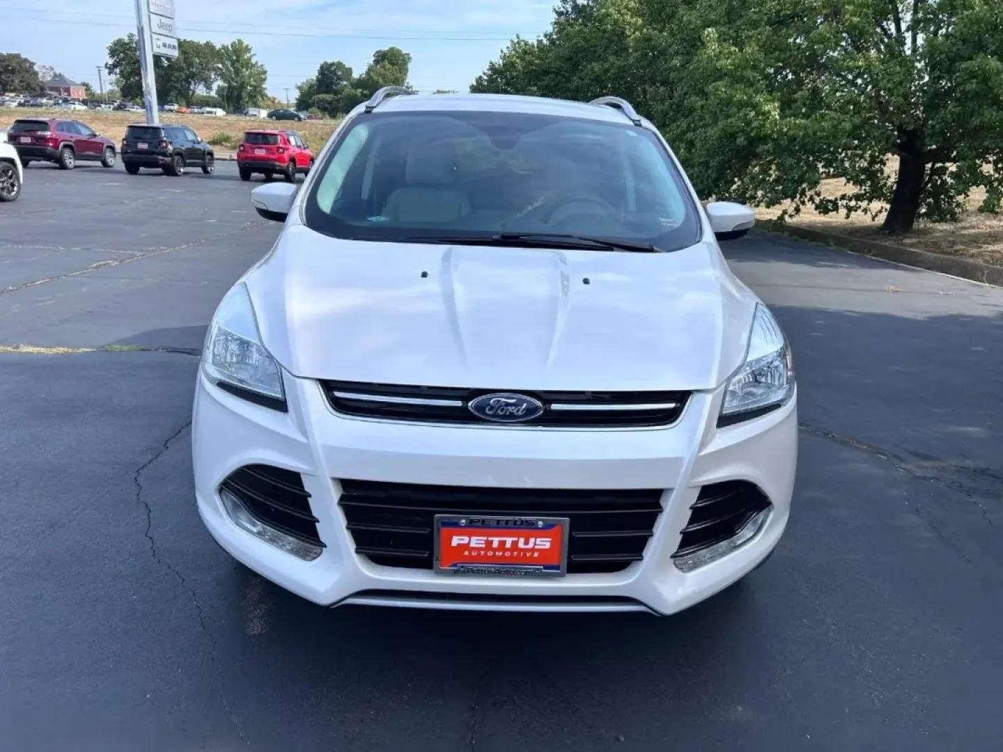 2016 /Medium Light Stone Leather Ford Escape Titanium (1FMCU0JX8GU) with an 1.6L EcoBoost engine, Automatic transmission, located at 970 Woodlawn Dr., Farmington, MO, 63640, (573) 431-7800, 37.825642, -90.468674 - Are you ready for your next adventure? Whether you're commuting to work, taking the family on a weekend getaway, or exploring the scenic routes around Farmington, the 2016 Ford Escape Titanium is the perfect companion for all your journeys. With its spacious interior, advanced technology, and except - Photo#8