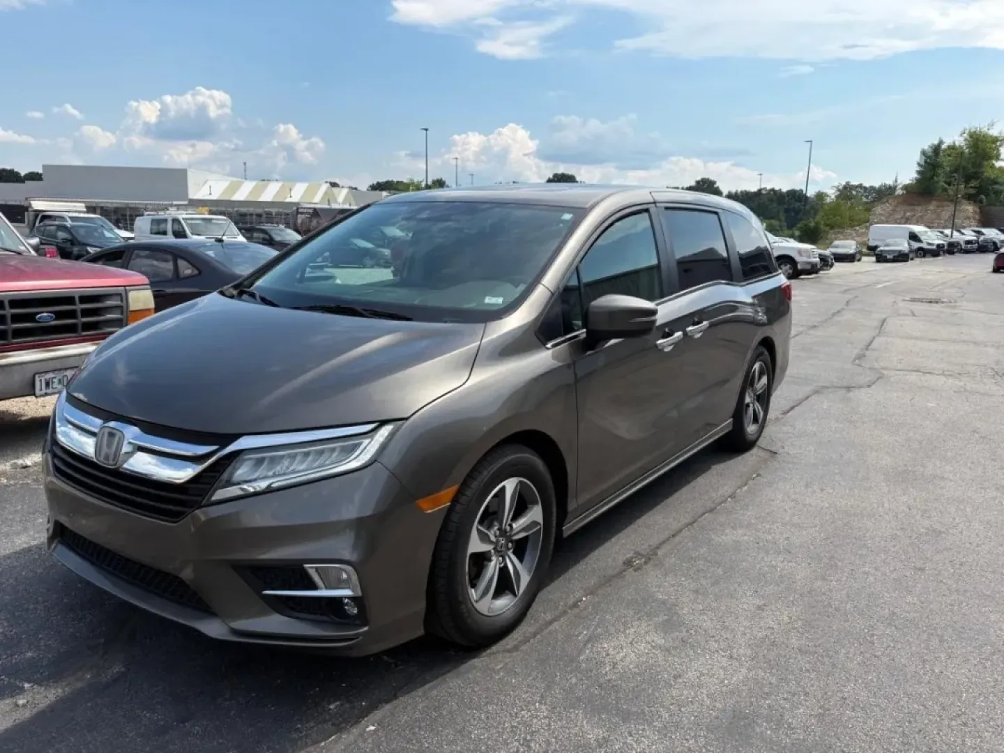 2018 /Gray Honda Odyssey Touring (5FNRL6H8XJB) with an Other engine, Automatic transmission, located at 12836 Highway 21, De Soto, MO, 63020, (636) 337-7777, 38.151867, -90.575615 - **Discover Family Adventures with the 2018 Honda Odyssey Touring at Pettus Ford De Soto!**<br /> <br /> Are you ready to elevate your family's road trips and daily commutes? The 2018 Honda Odyssey Touring is the ultimate minivan designed to cater to families on the go. With ample space, advanced tec - Photo#0
