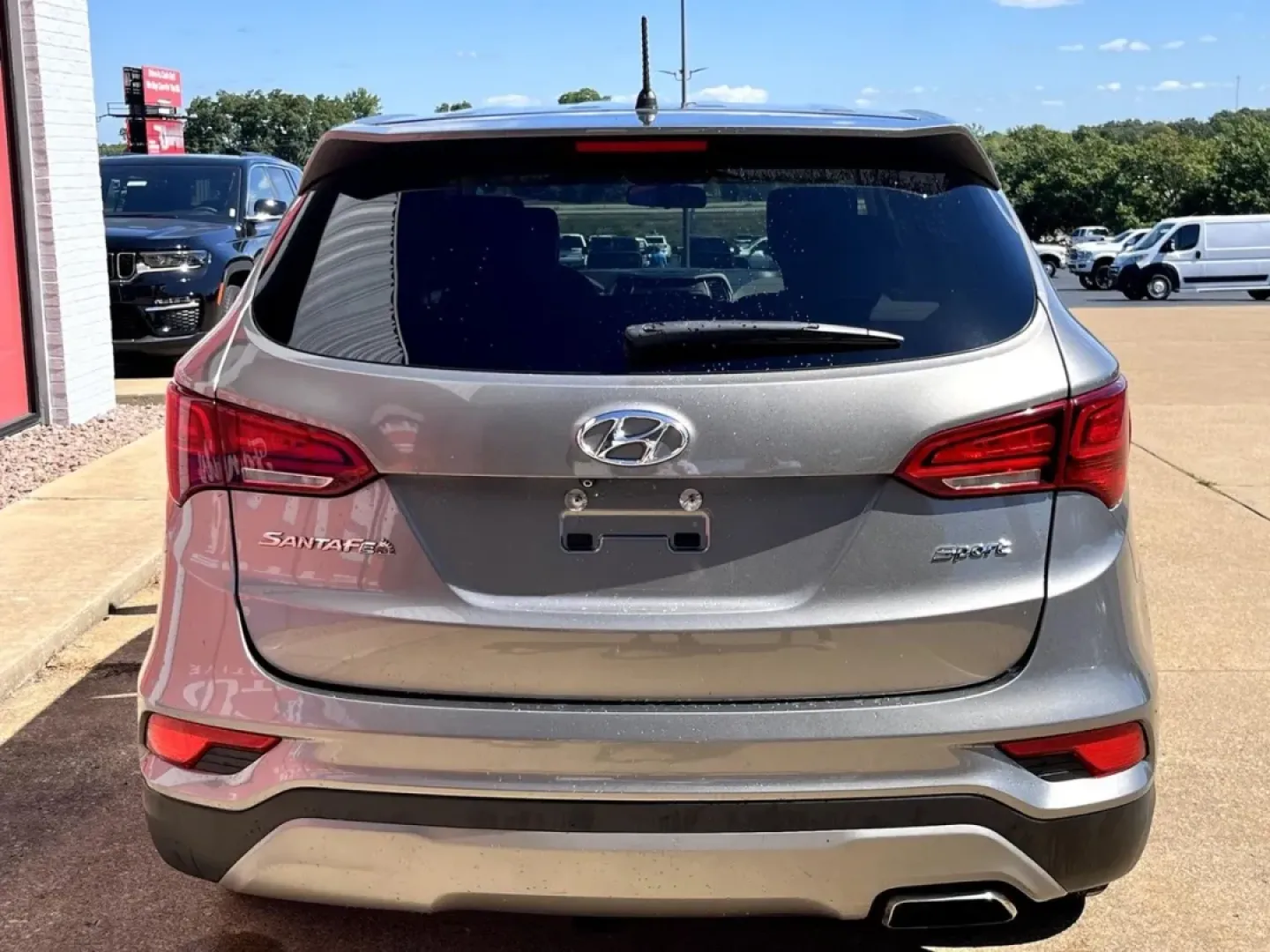 2018 Hyundai Santa Fe 2.4 Base (5NMZT3LBXJH) with an 2.4L engine, located at 970 Woodlawn Dr., Farmington, MO, 63640, (573) 431-7800, 37.825642, -90.468674 - Are you ready to elevate your family adventures or daily commutes? Look no further! This 2018 Hyundai Santa Fe is the perfect blend of comfort, reliability, and versatility that every modern family or commuter dreams of. With ample space and impressive fuel efficiency, this SUV is designed to cater - Photo#3
