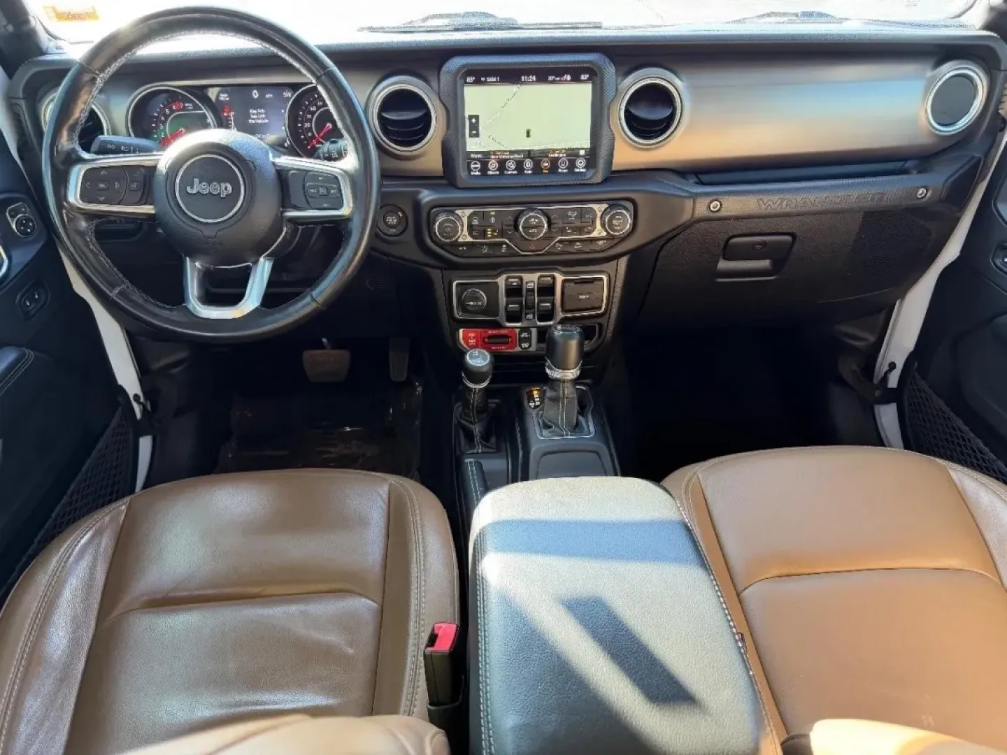 2021 /Dark Saddle/Black Leather Jeep Wrangler Unlimited Rubicon (1C4HJXFNXMW) with an 2.0L engine, 6A transmission, located at 970 Woodlawn Dr., Farmington, MO, 63640, (573) 431-7800, 37.825642, -90.468674 - Experience adventure like never before with the rugged and versatile 2021 Jeep Wrangler, now available at Pettus CDJR Farmington! This SUV is perfect for those seeking a reliable companion for weekend getaways, daily commutes, or off-road escapades. Whether you're cruising through the scenic routes - Photo#9