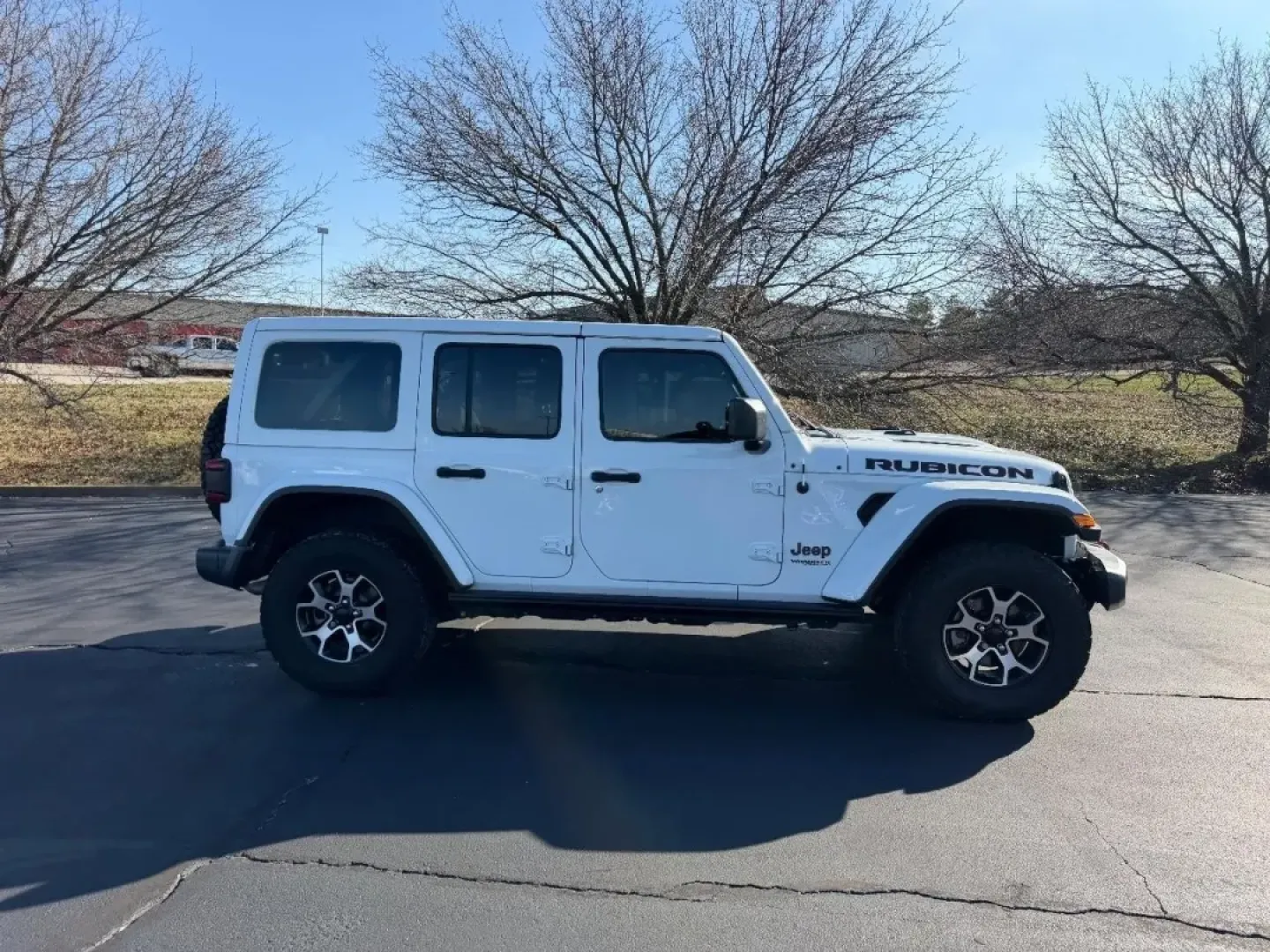 2021 /Dark Saddle/Black Leather Jeep Wrangler Unlimited Rubicon (1C4HJXFNXMW) with an 2.0L engine, 6A transmission, located at 970 Woodlawn Dr., Farmington, MO, 63640, (573) 431-7800, 37.825642, -90.468674 - Experience adventure like never before with the rugged and versatile 2021 Jeep Wrangler, now available at Pettus CDJR Farmington! This SUV is perfect for those seeking a reliable companion for weekend getaways, daily commutes, or off-road escapades. Whether you're cruising through the scenic routes - Photo#1